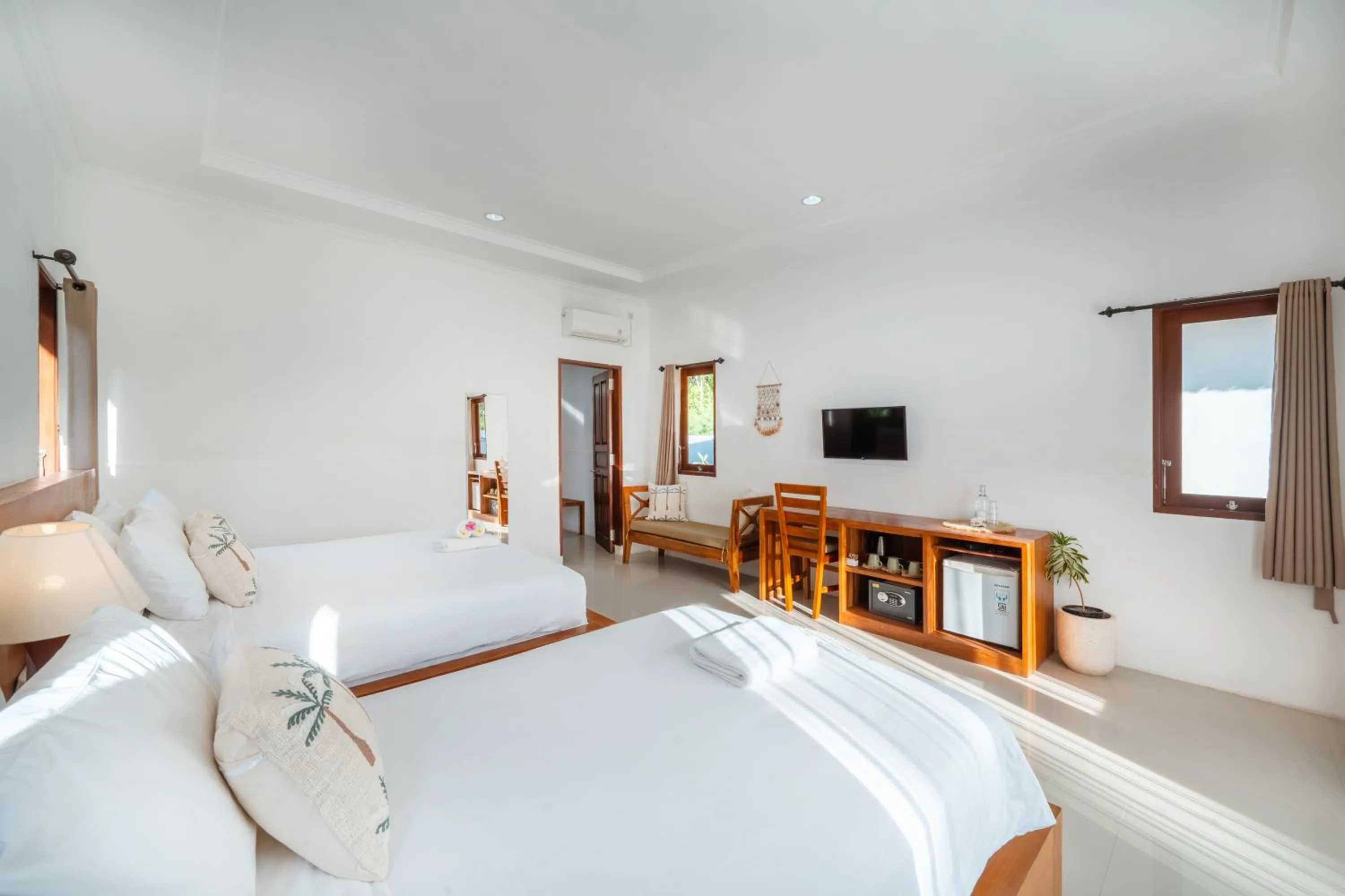 Bed in Nusa Indah Onai Hotel