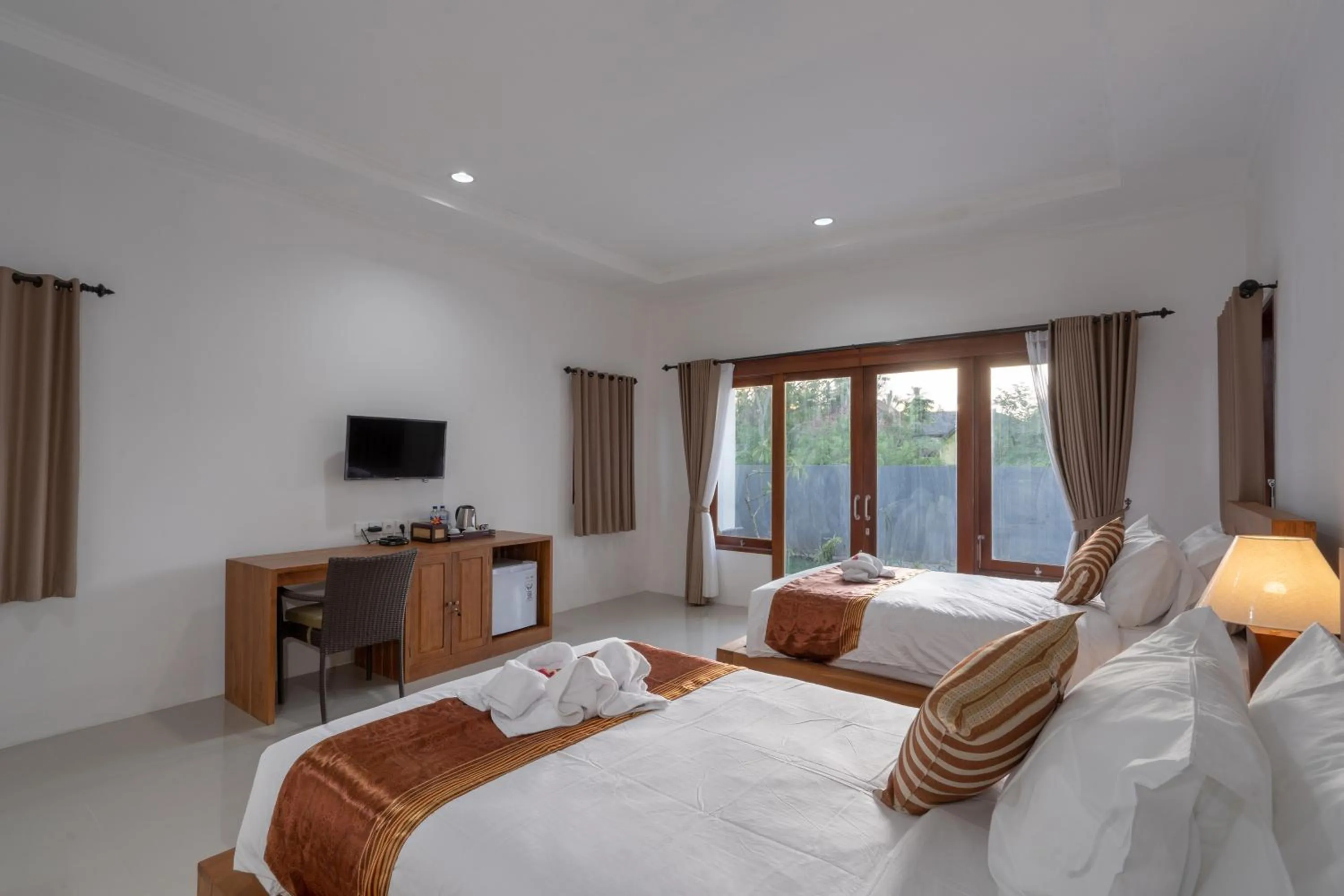 Bed in Nusa Indah Onai Hotel