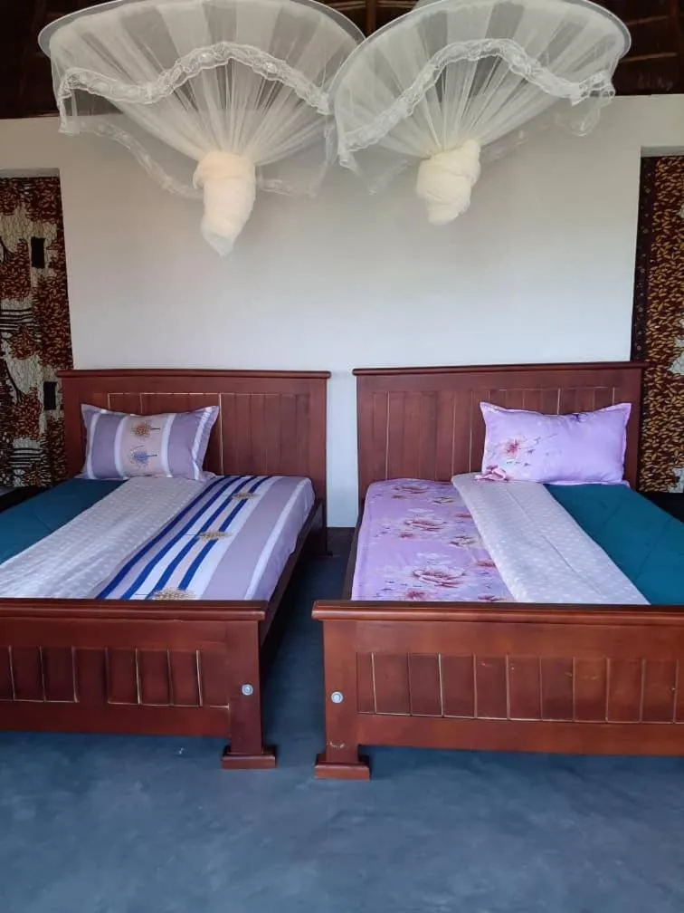 Bed in Tangi Safari Lodge