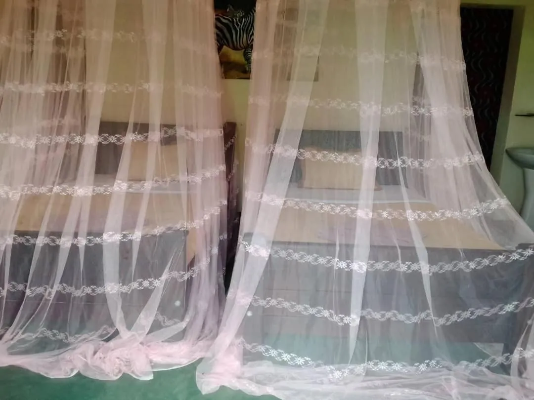 Bedroom, Bed in Tangi Safari Lodge