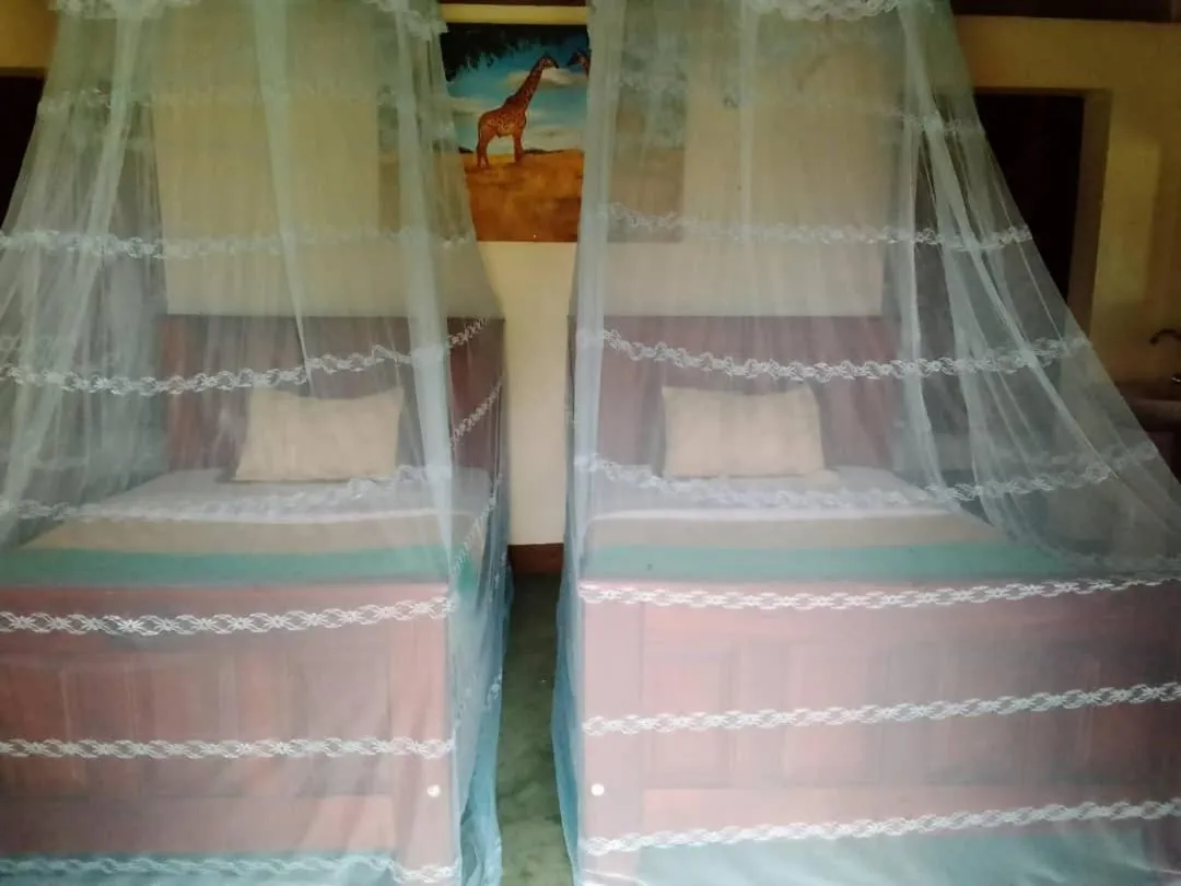 Bed in Tangi Safari Lodge