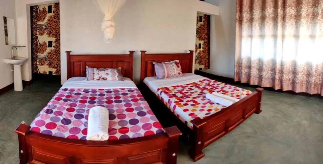 Photo of the whole room, Bed in Tangi Safari Lodge