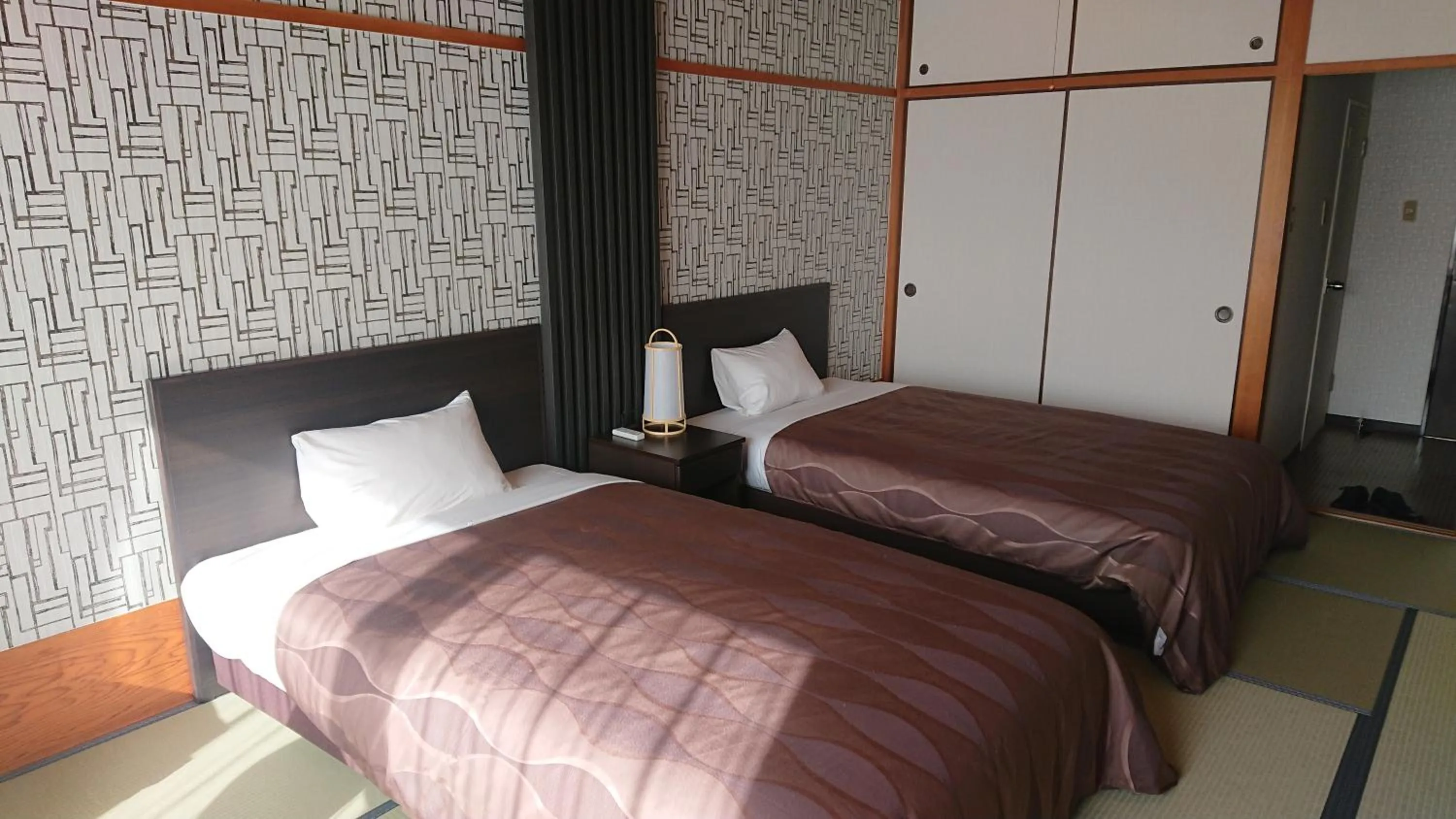 Bed in The Gran Resort Arima