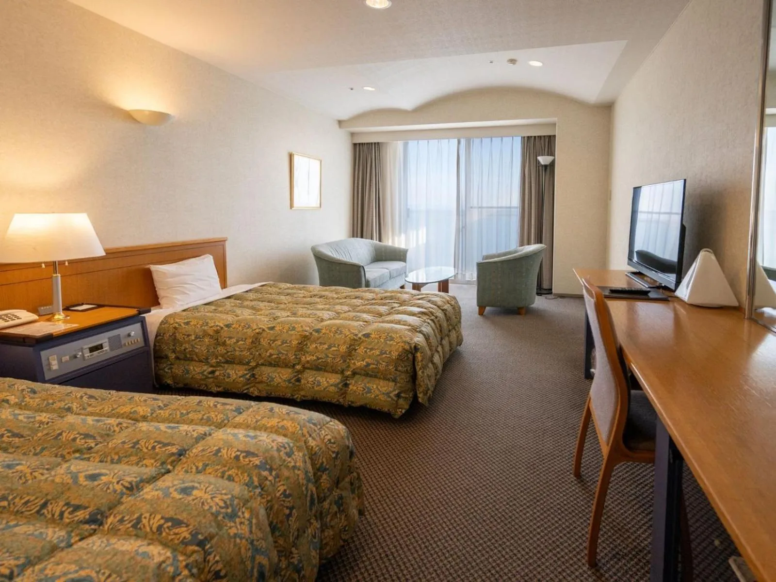 Bed in The Gran Resort Elegante Awajishima