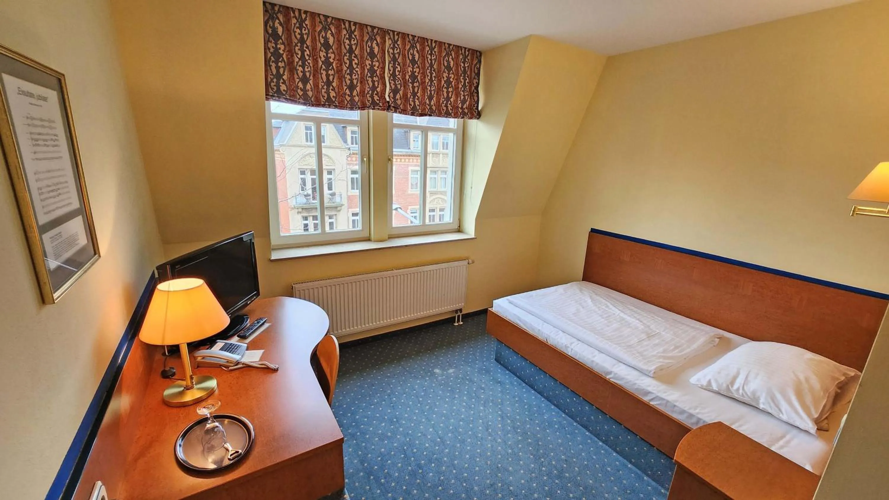Photo of the whole room, Bed in Hotel Amadeus Dresden Neustadt