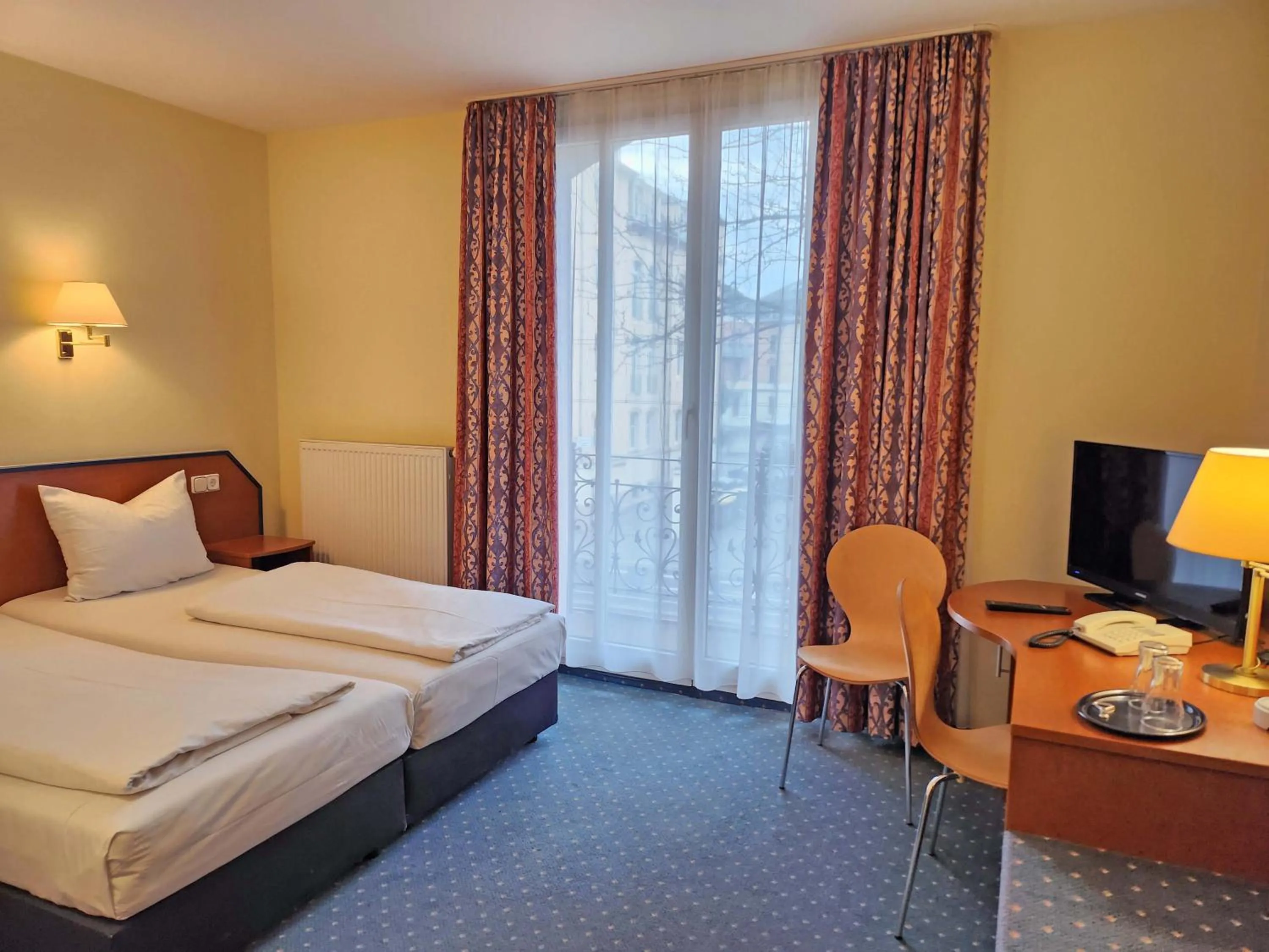 Photo of the whole room, Bed in Hotel Amadeus Dresden Neustadt