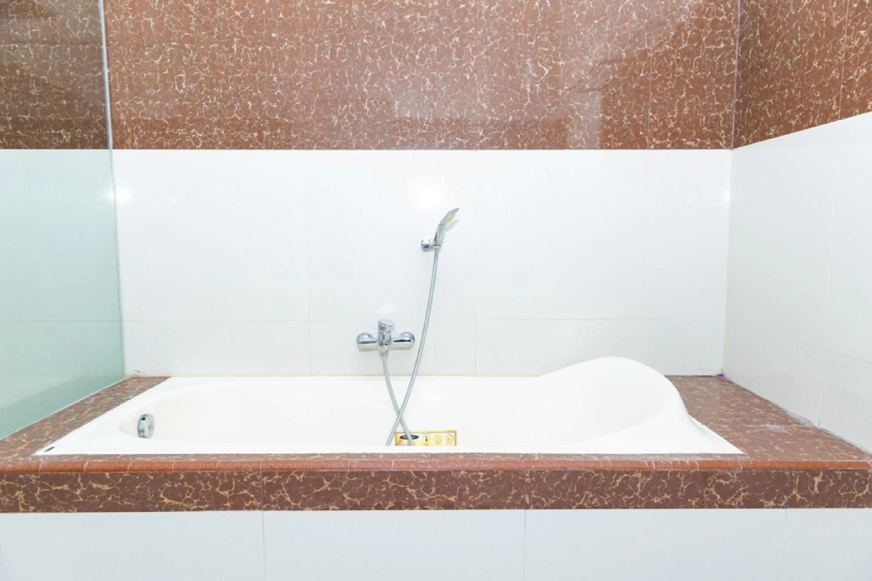 Bathroom in RedDoorz Premium @ Sea Residence Manado