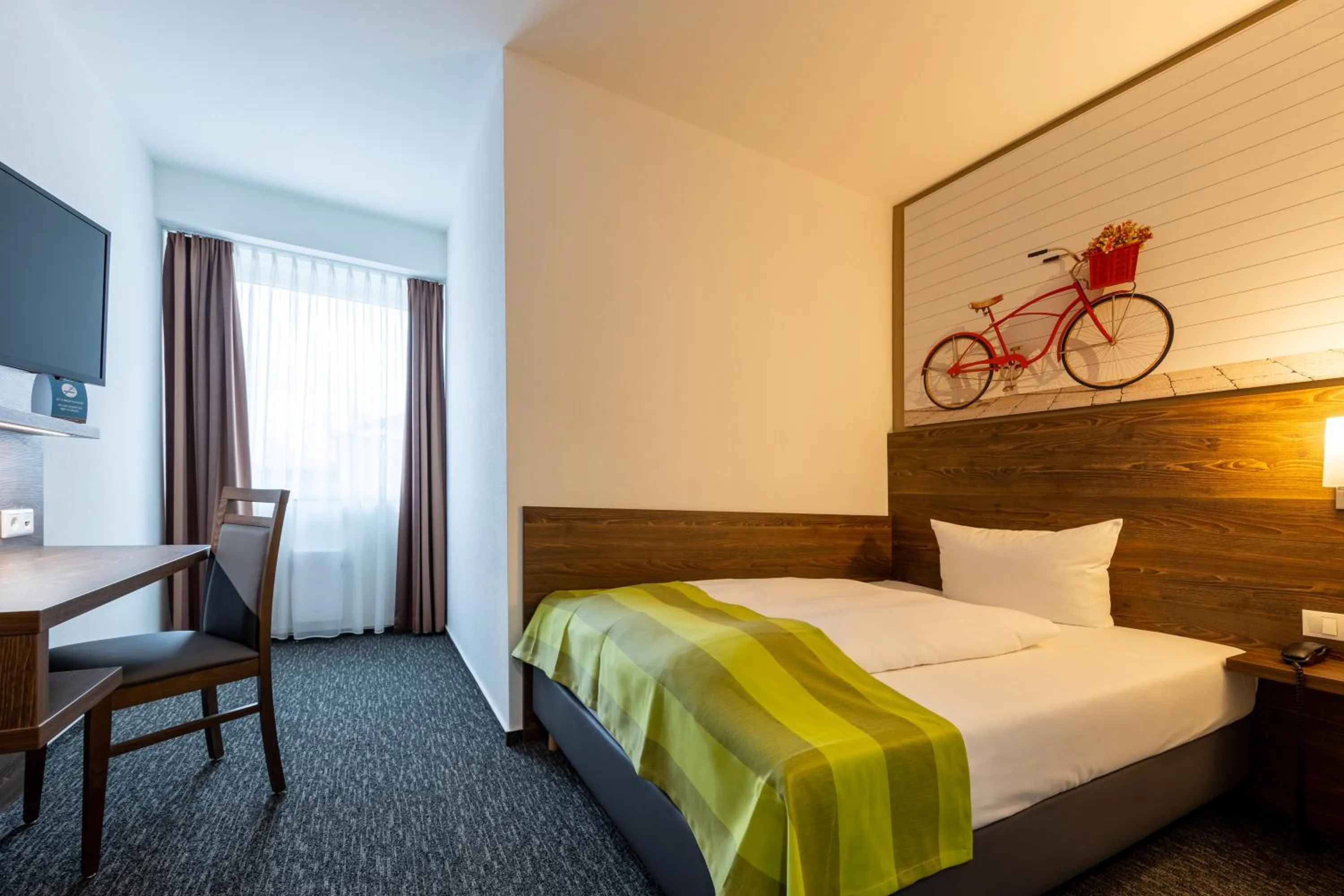 Photo of the whole room, Bed in Trip Inn Hotel Münster City