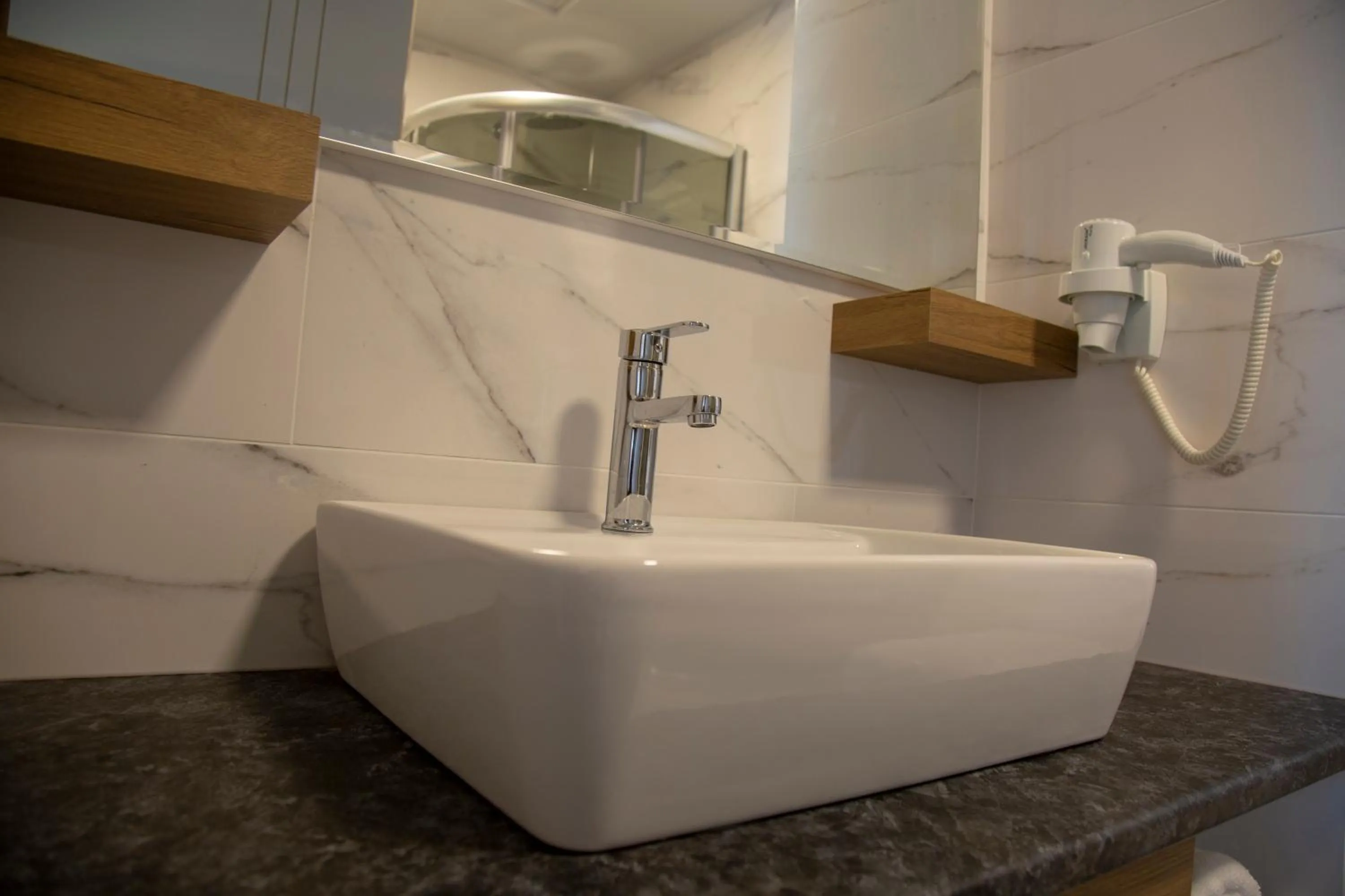 Bathroom in Golden World Suite Hotel