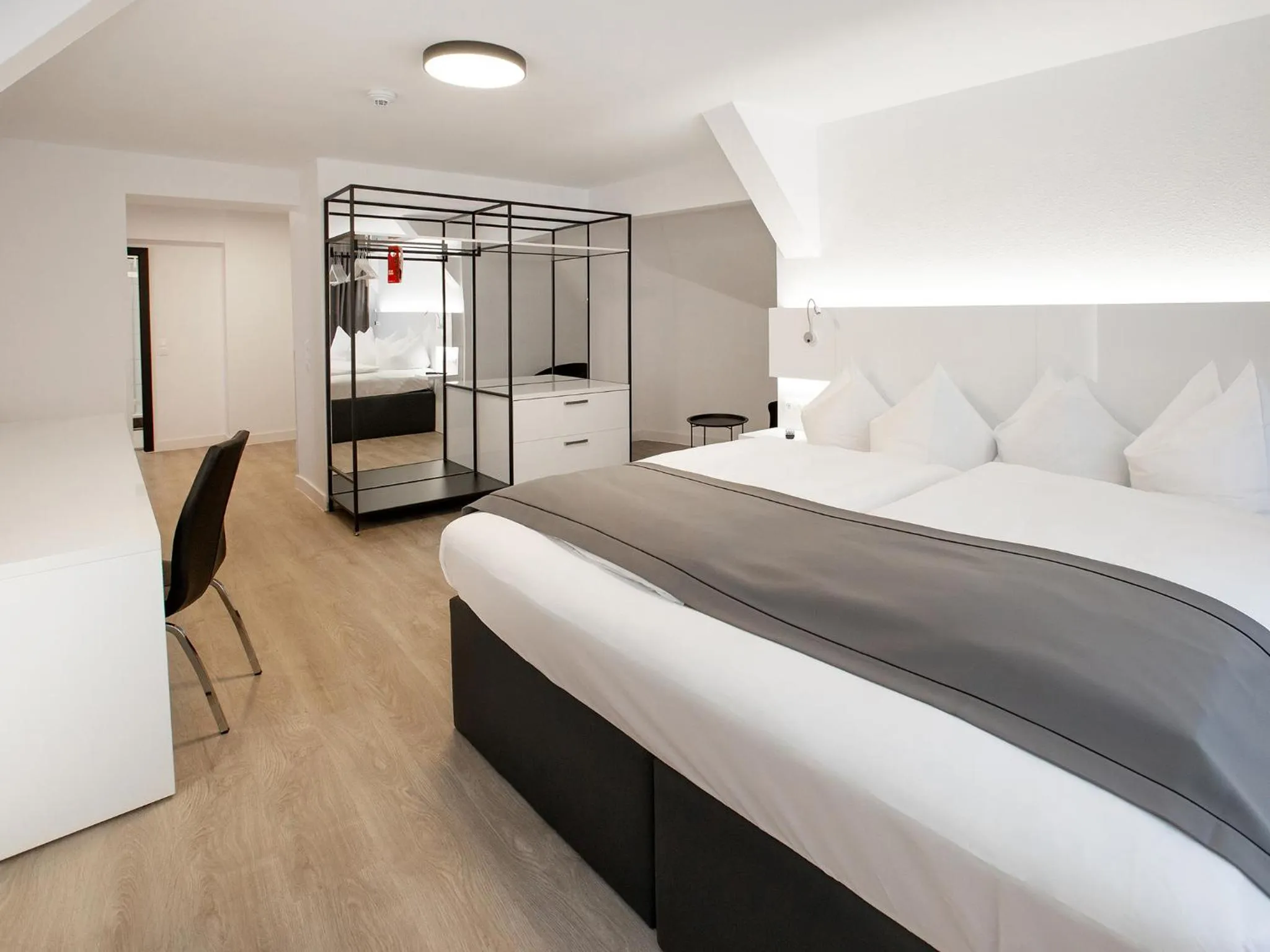 Photo of the whole room, Bed in DORMERO Hotel Worms