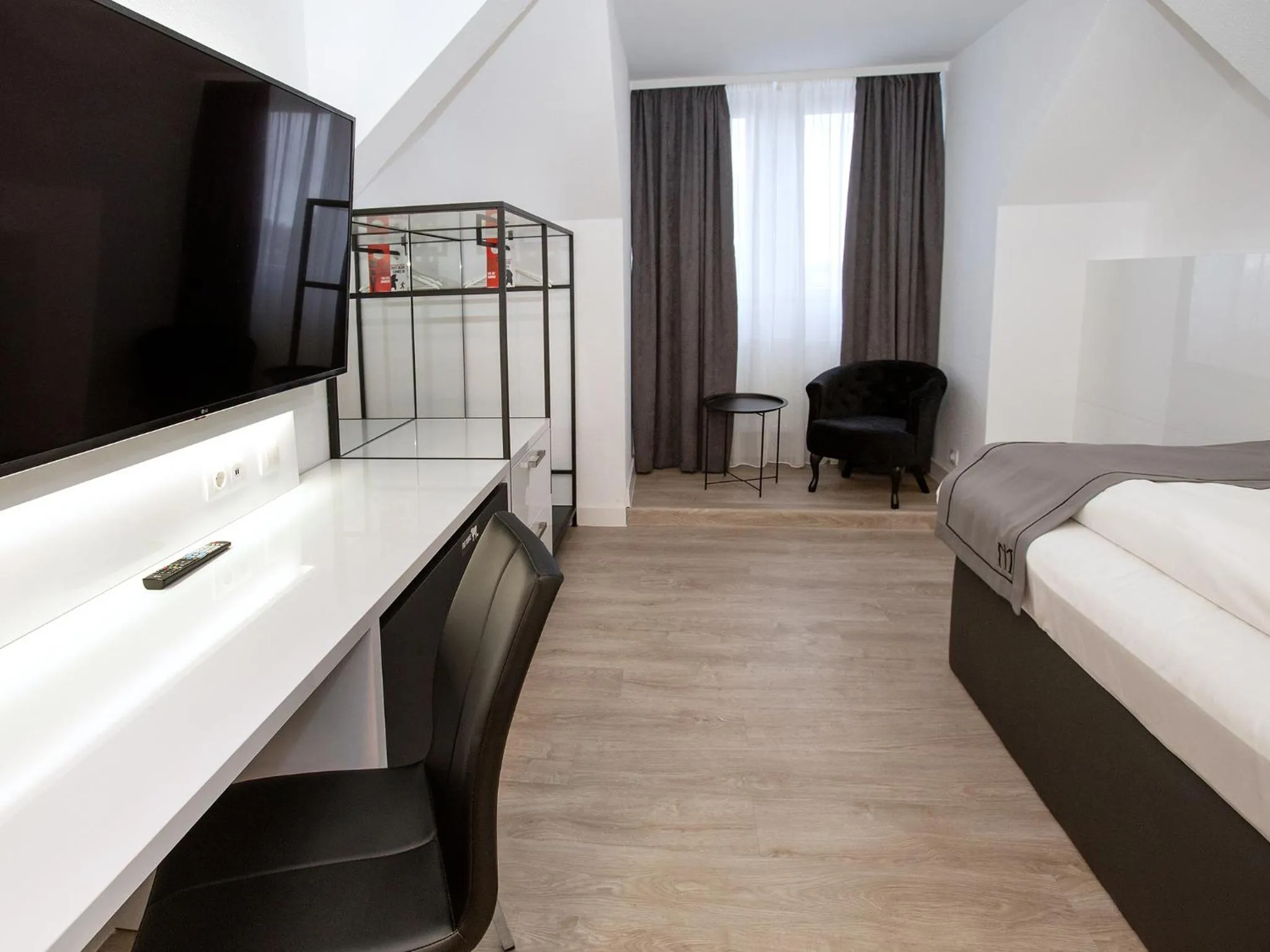 Photo of the whole room, Bed in DORMERO Hotel Worms