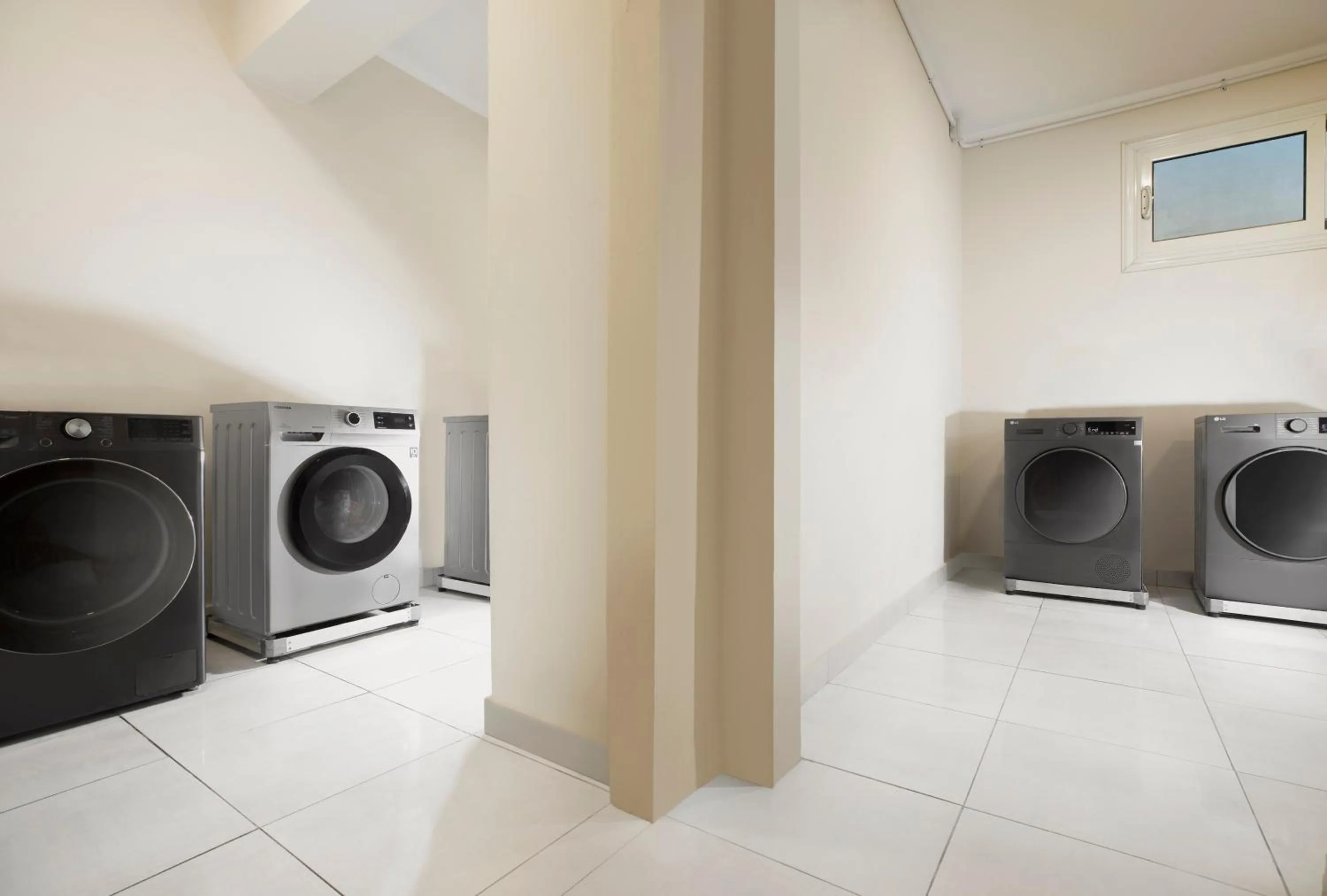 washing machine in Vibotel Residence Hotel Apartments