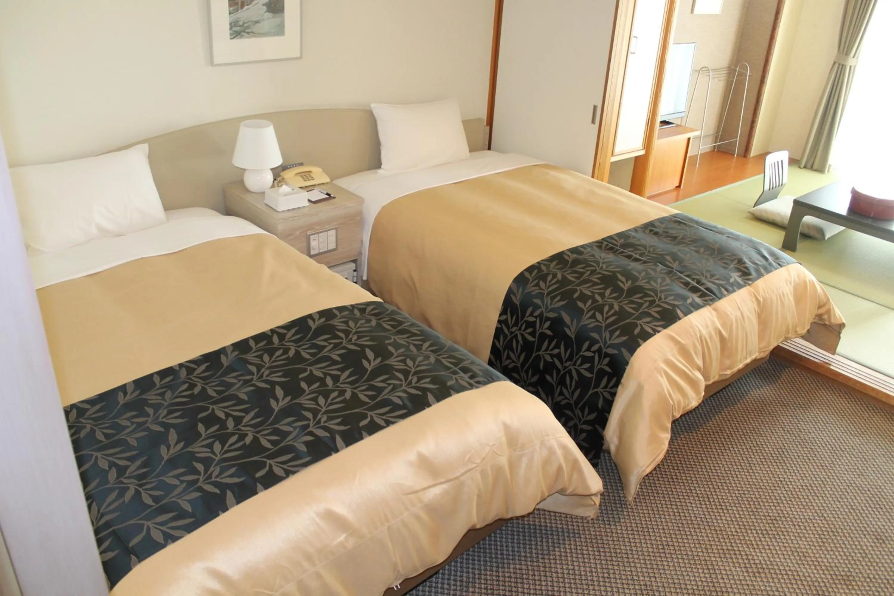 Bed in The Gran Resort Princess Arima