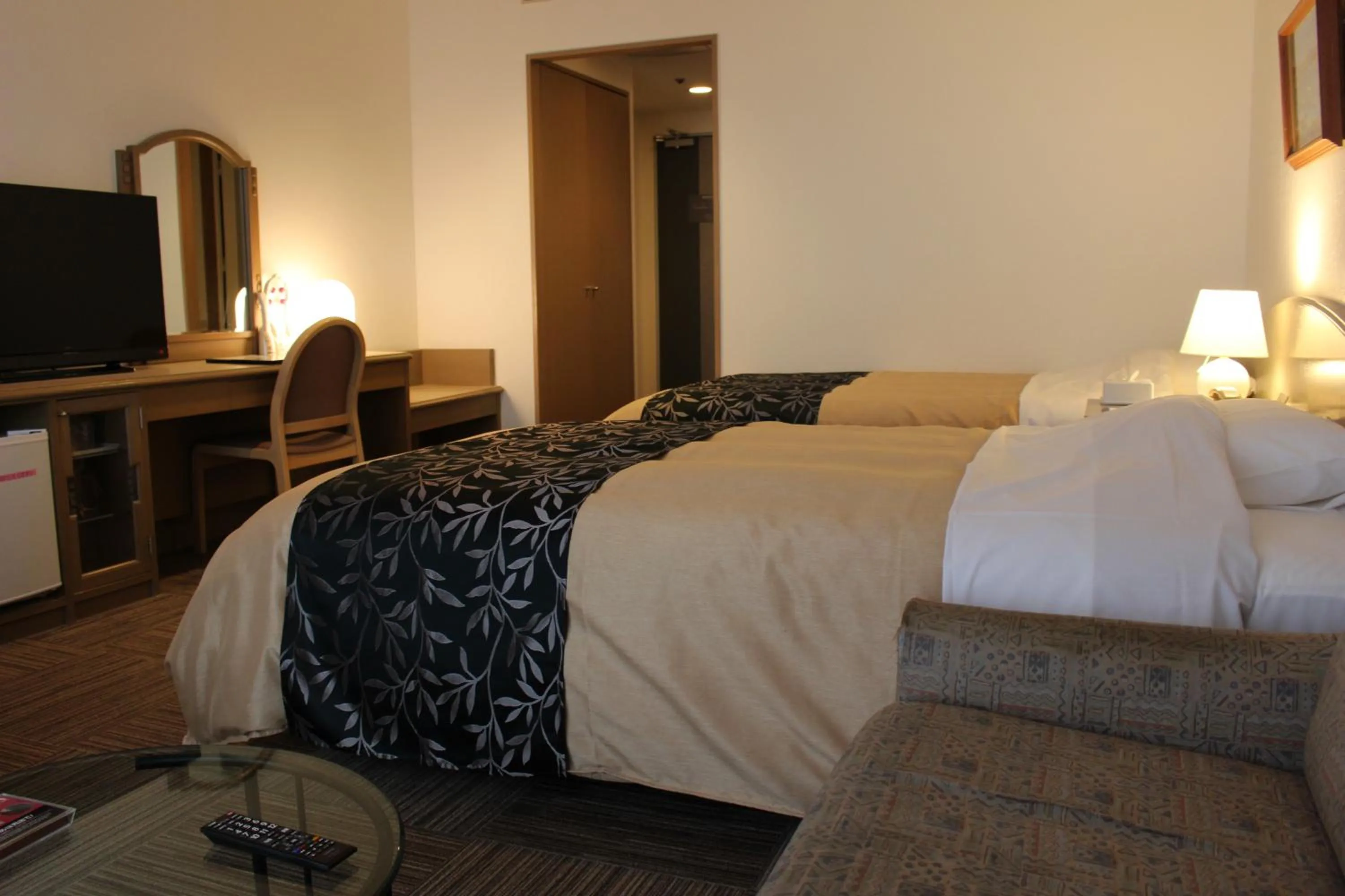 Bed in The Gran Resort Princess Arima