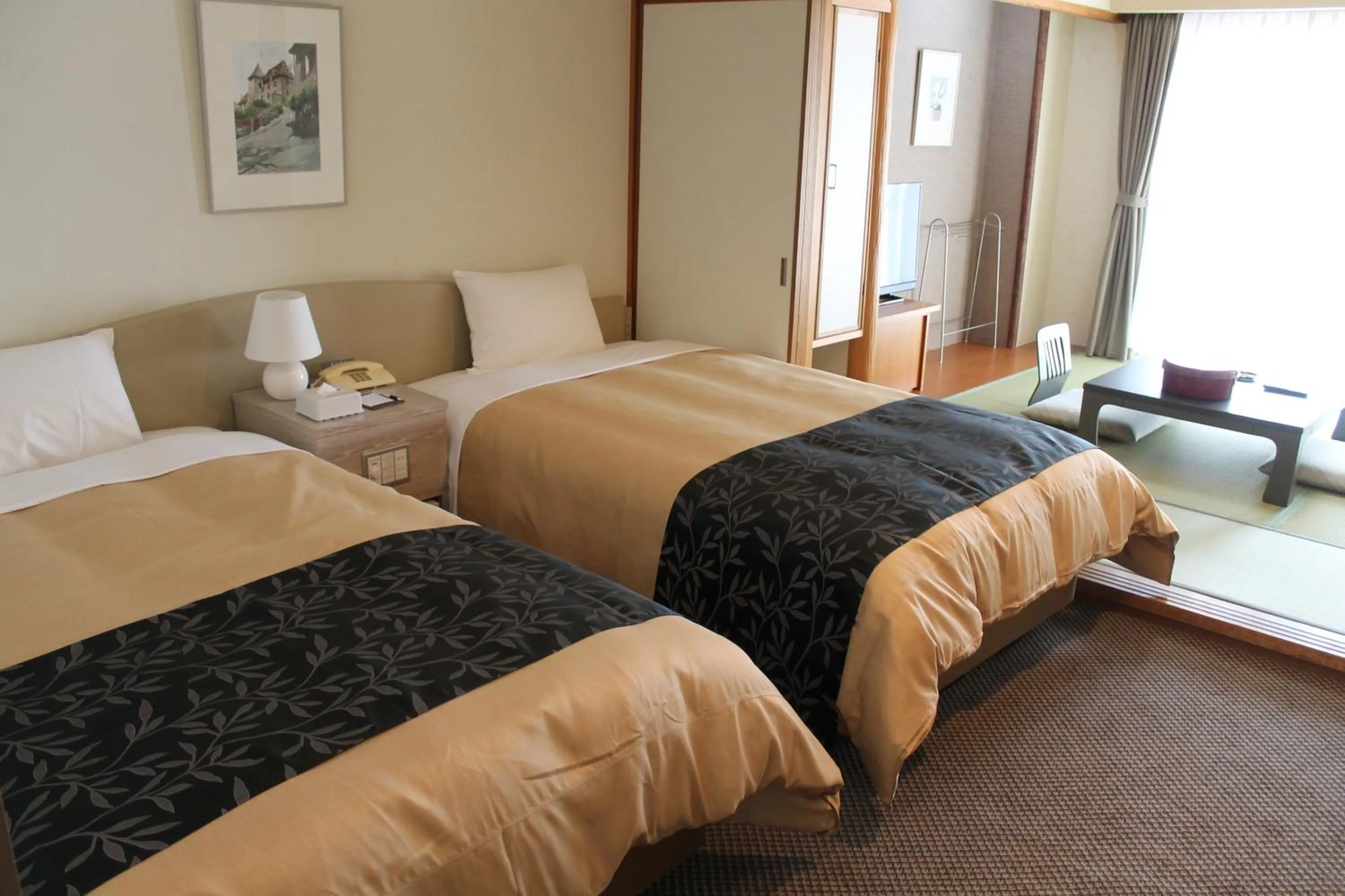 Bed in The Gran Resort Princess Arima