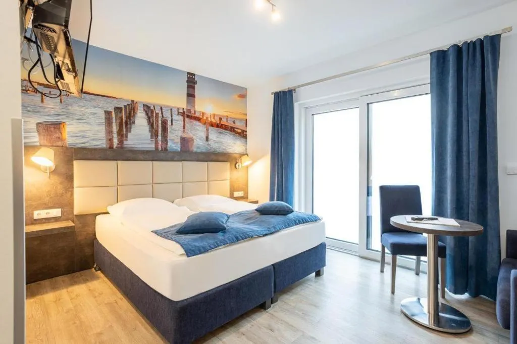 Bed in Familien- und Aparthotel Strandhof