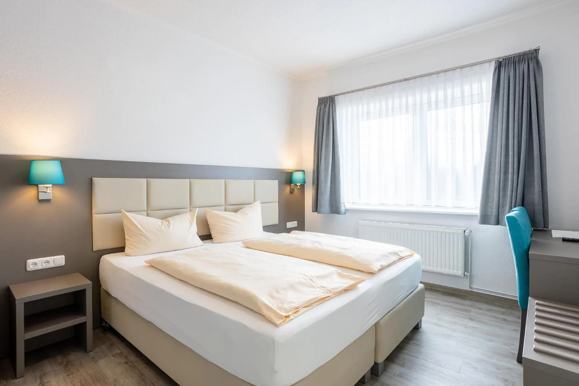 Bed in Familien- und Aparthotel Strandhof