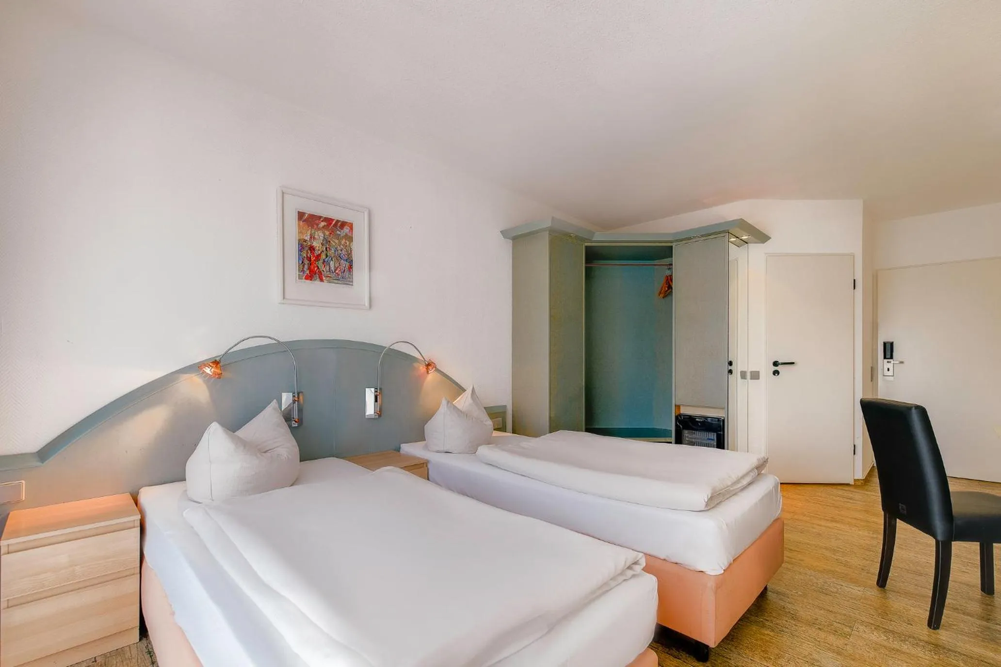 Photo of the whole room, Bed in Ambiente Langenhagen Hannover by Tulip Inn