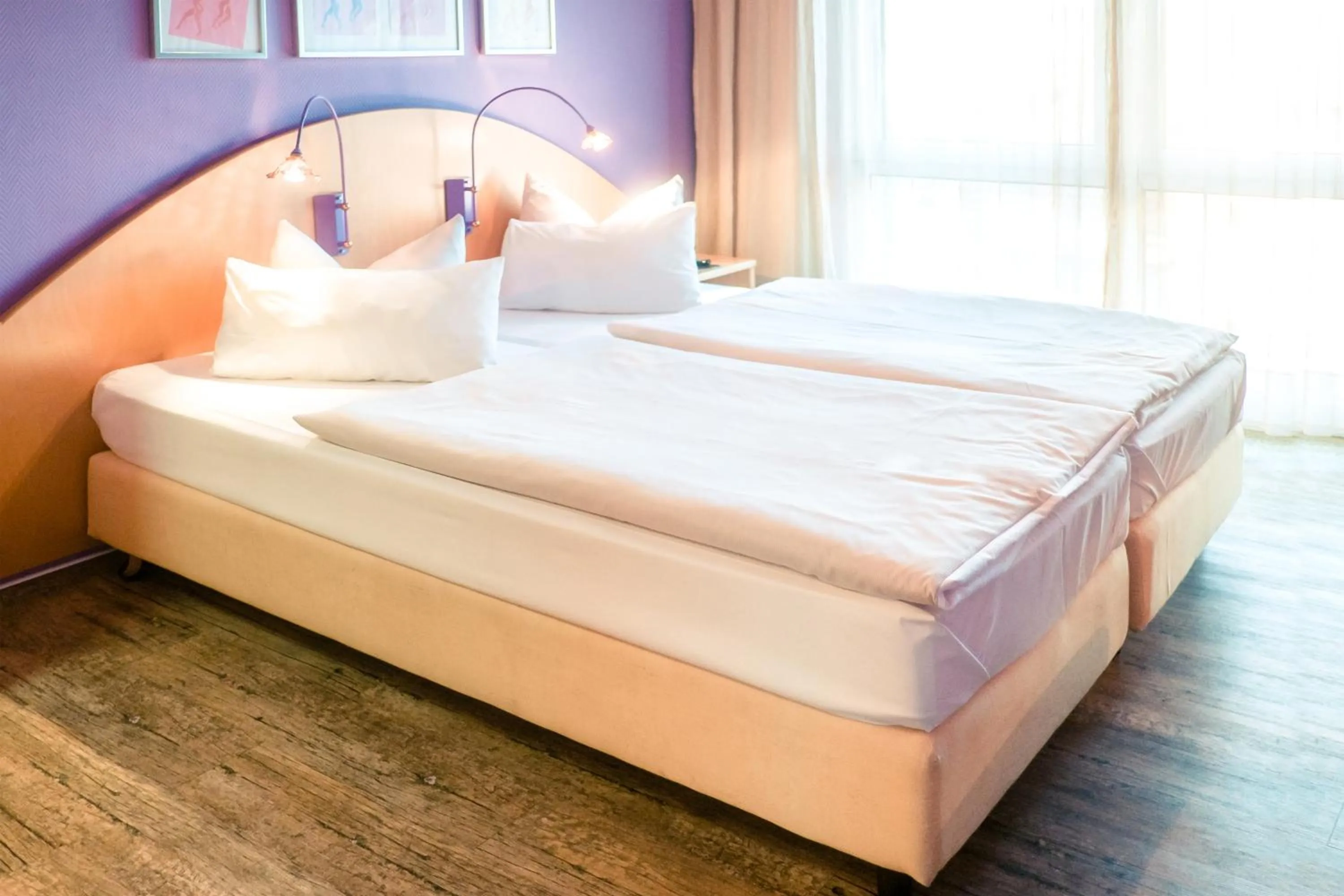 Photo of the whole room, Bed in Ambiente Langenhagen Hannover by Tulip Inn