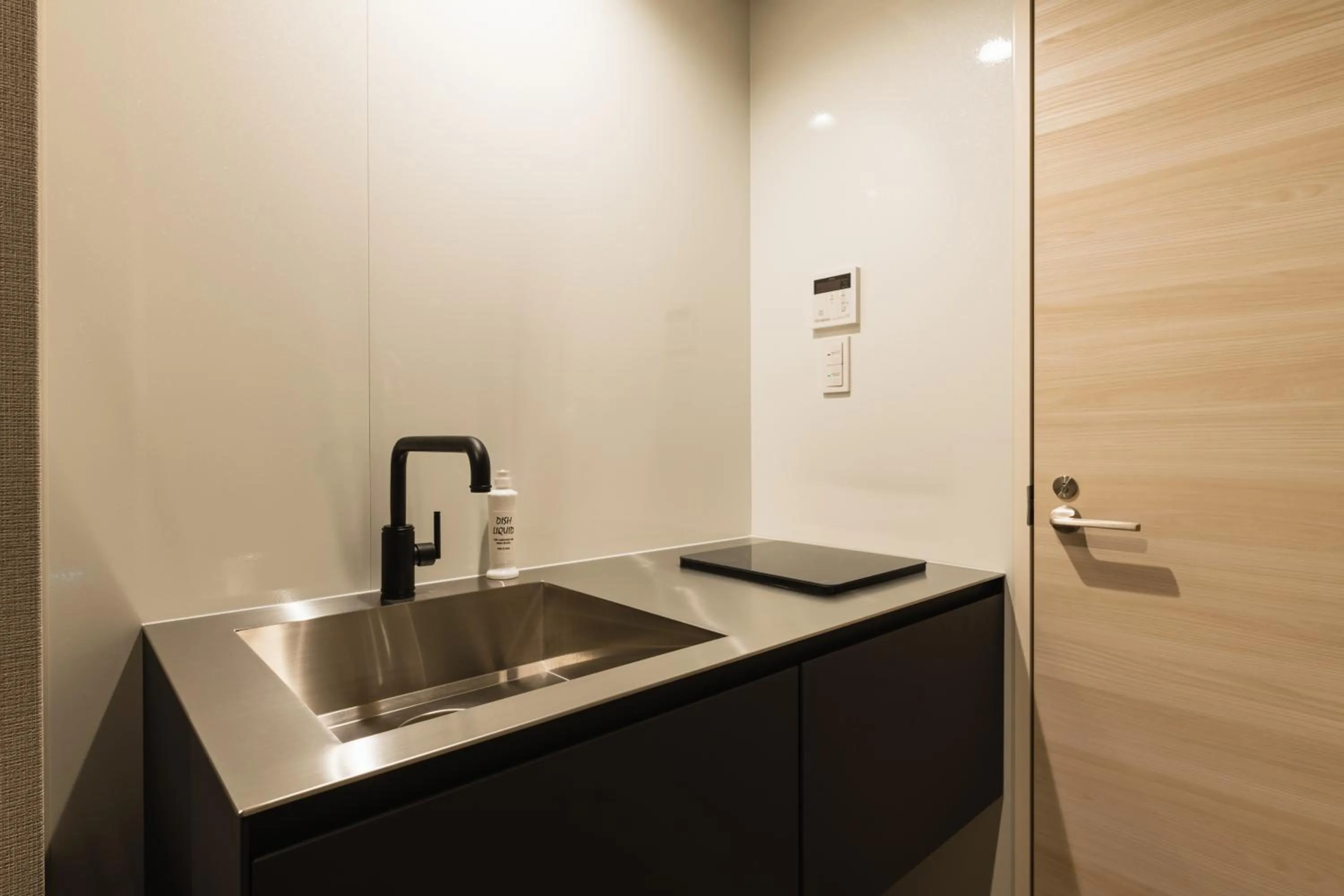 Kitchen or kitchenette in GRAND BASE Nagasaki City