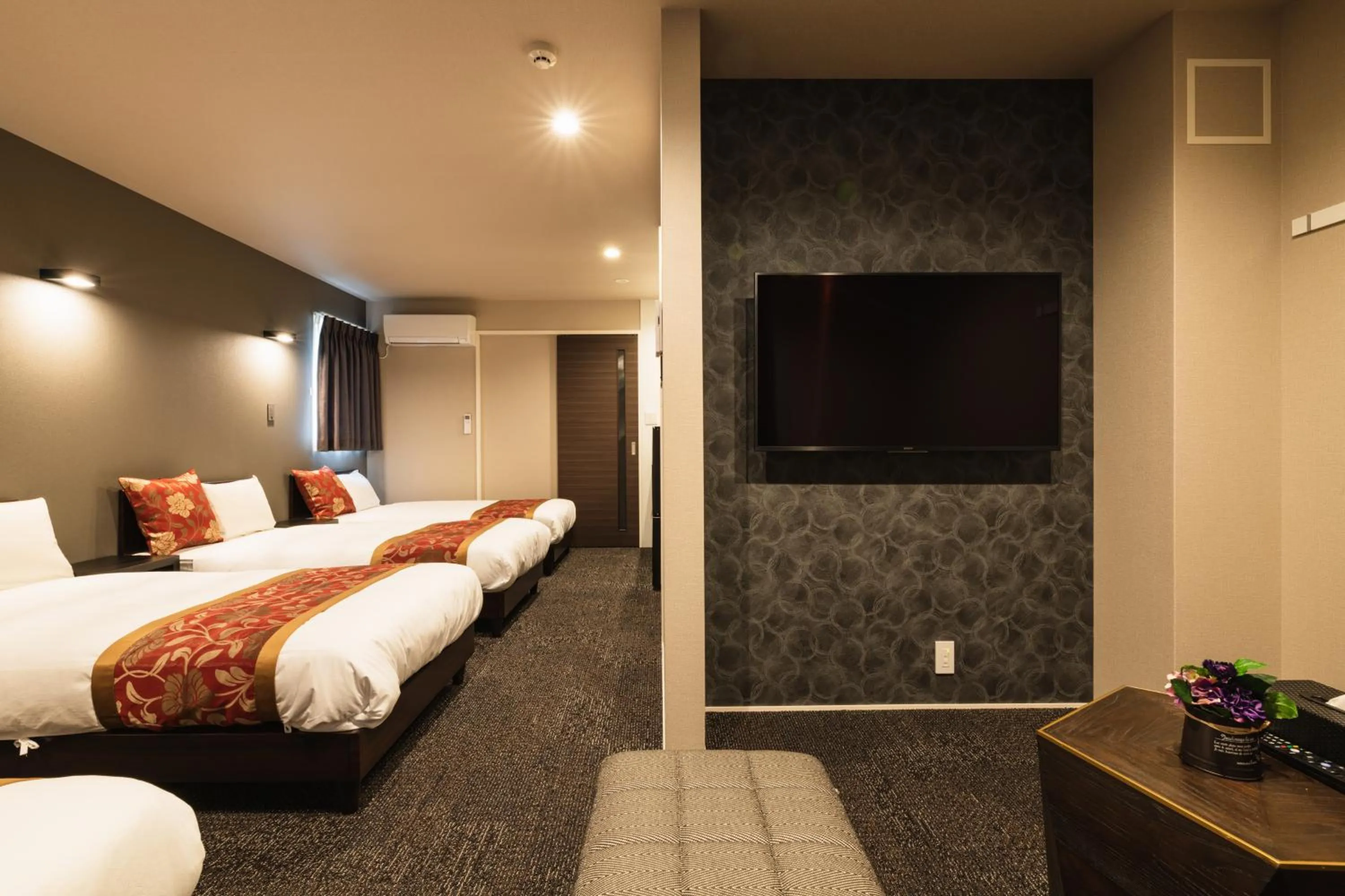 Photo of the whole room, Bed in GRAND BASE Nagasaki City