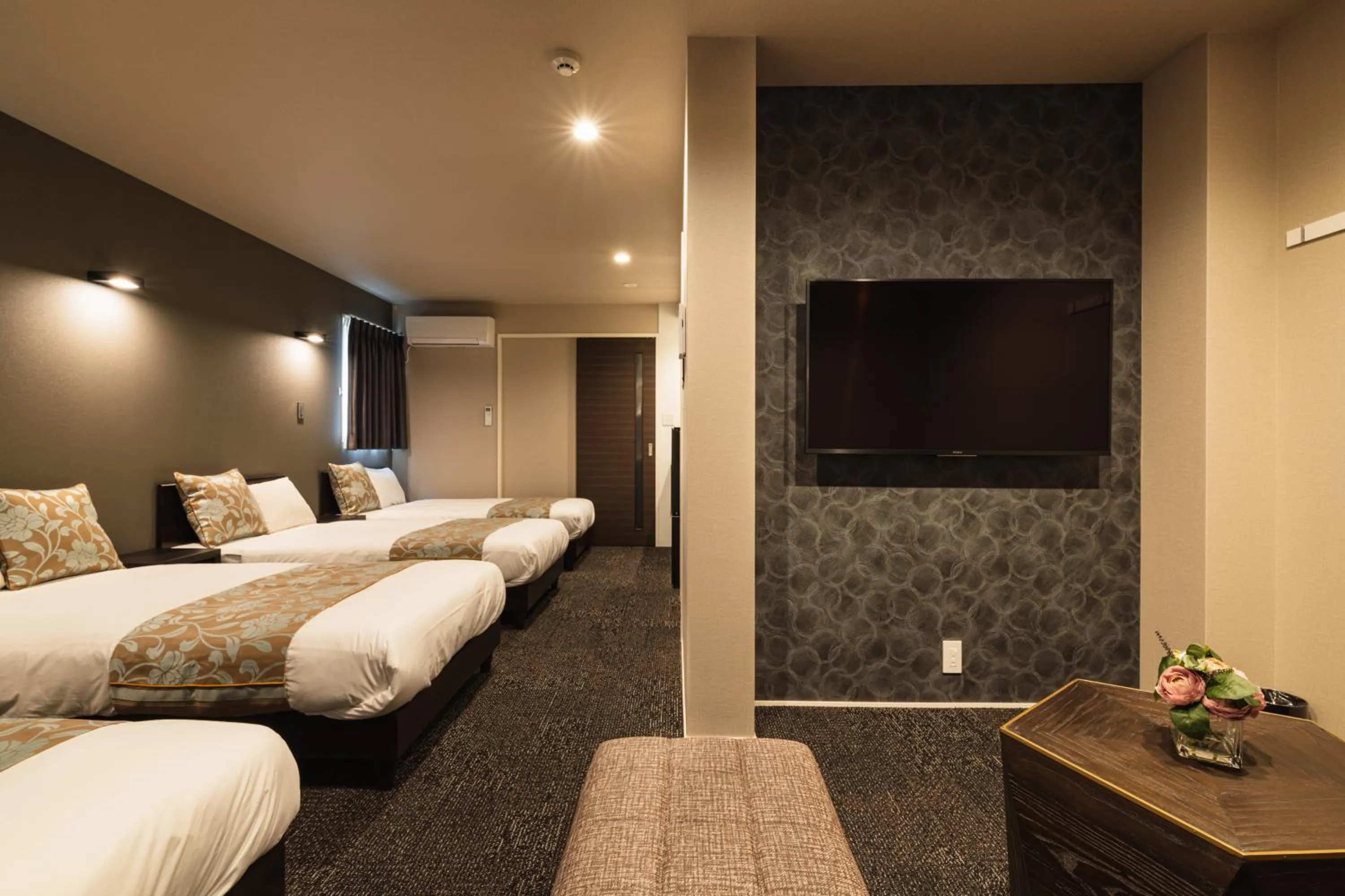 Photo of the whole room, Bed in GRAND BASE Nagasaki City