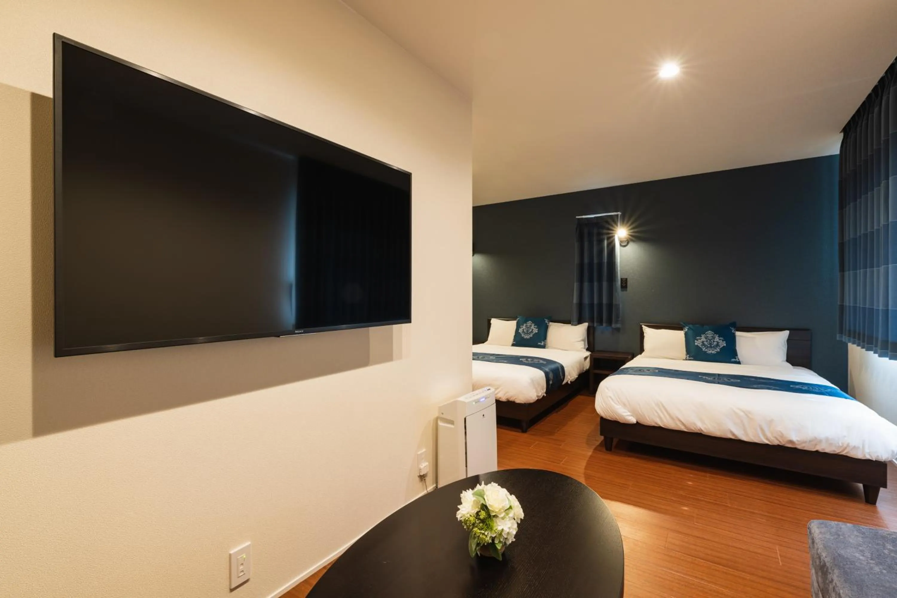 Photo of the whole room, Bed in GRAND BASE Nagasaki City