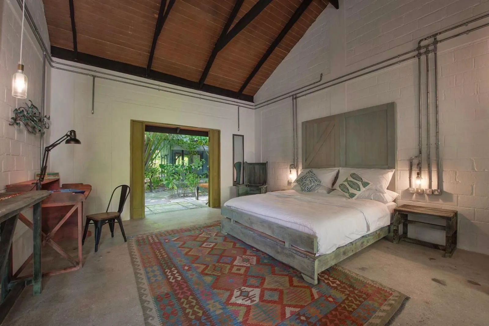 Photo of the whole room, Bed in Mi Lugar Maldives