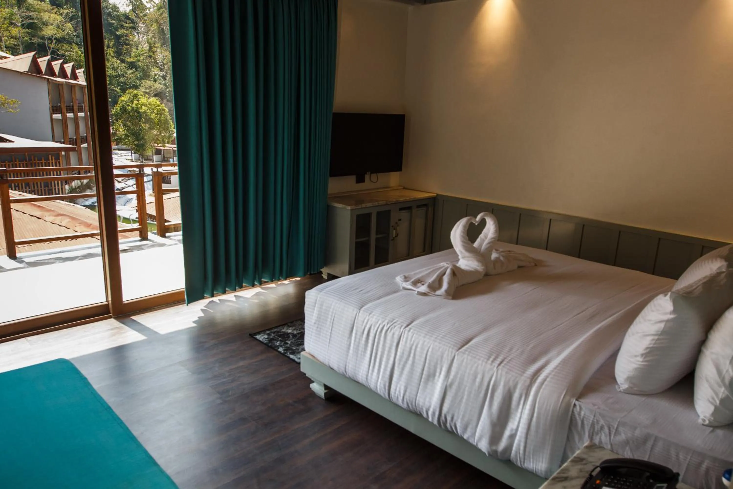 Bed in Symphony Samudra Beachside Jungle Resort And Spa