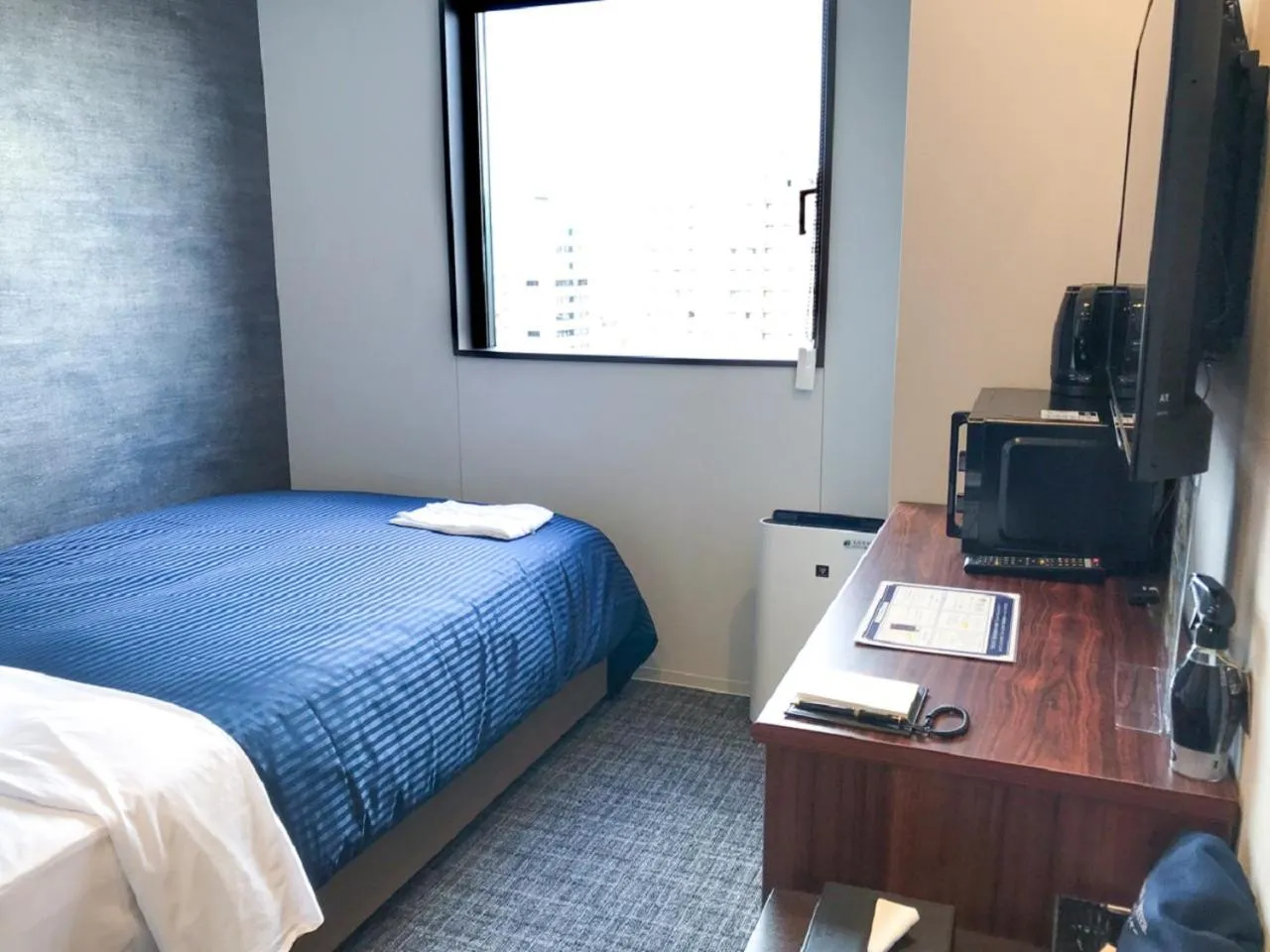 Bed in Hotel Livemax Fukushima Koriyama