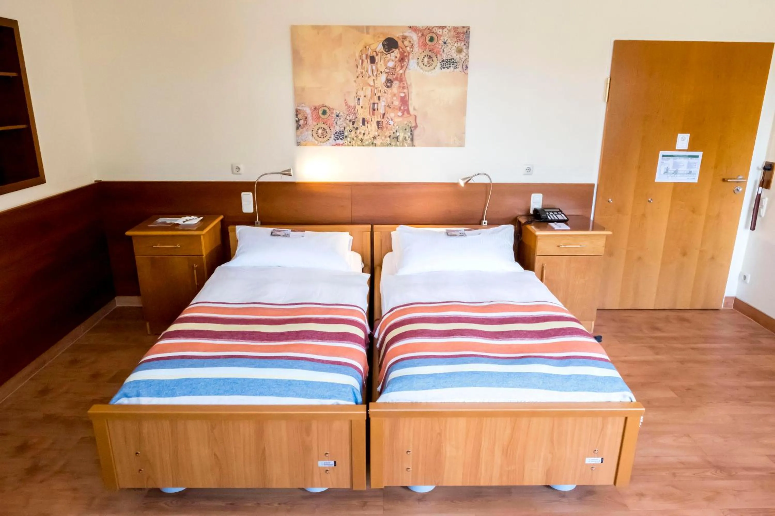 Photo of the whole room, Bed in Heidehotel Bad Bevensen