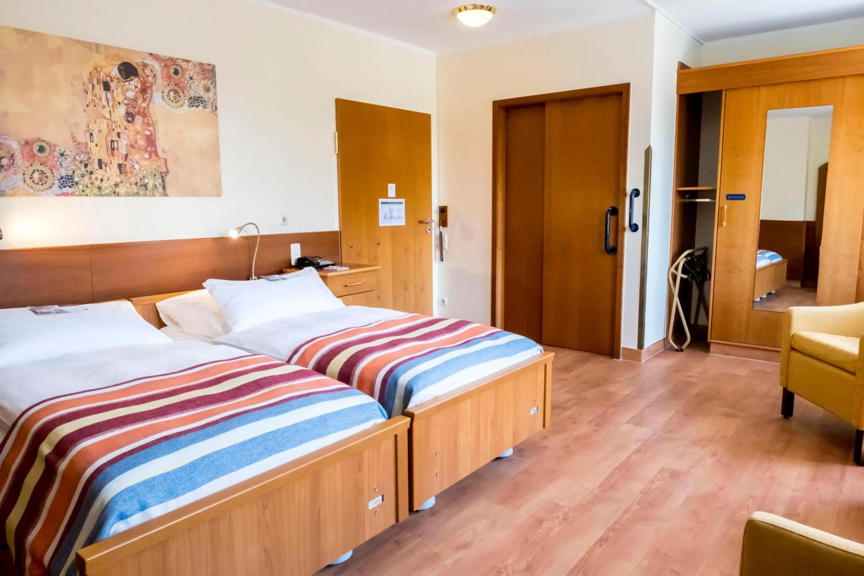 Photo of the whole room, Bed in Heidehotel Bad Bevensen