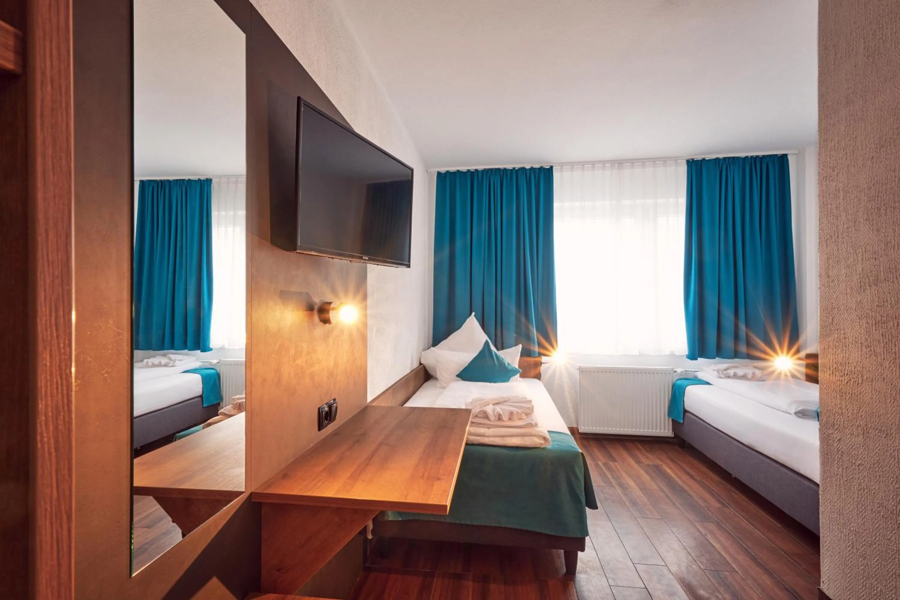 Bed in Hotel Hansa Stuttgart City