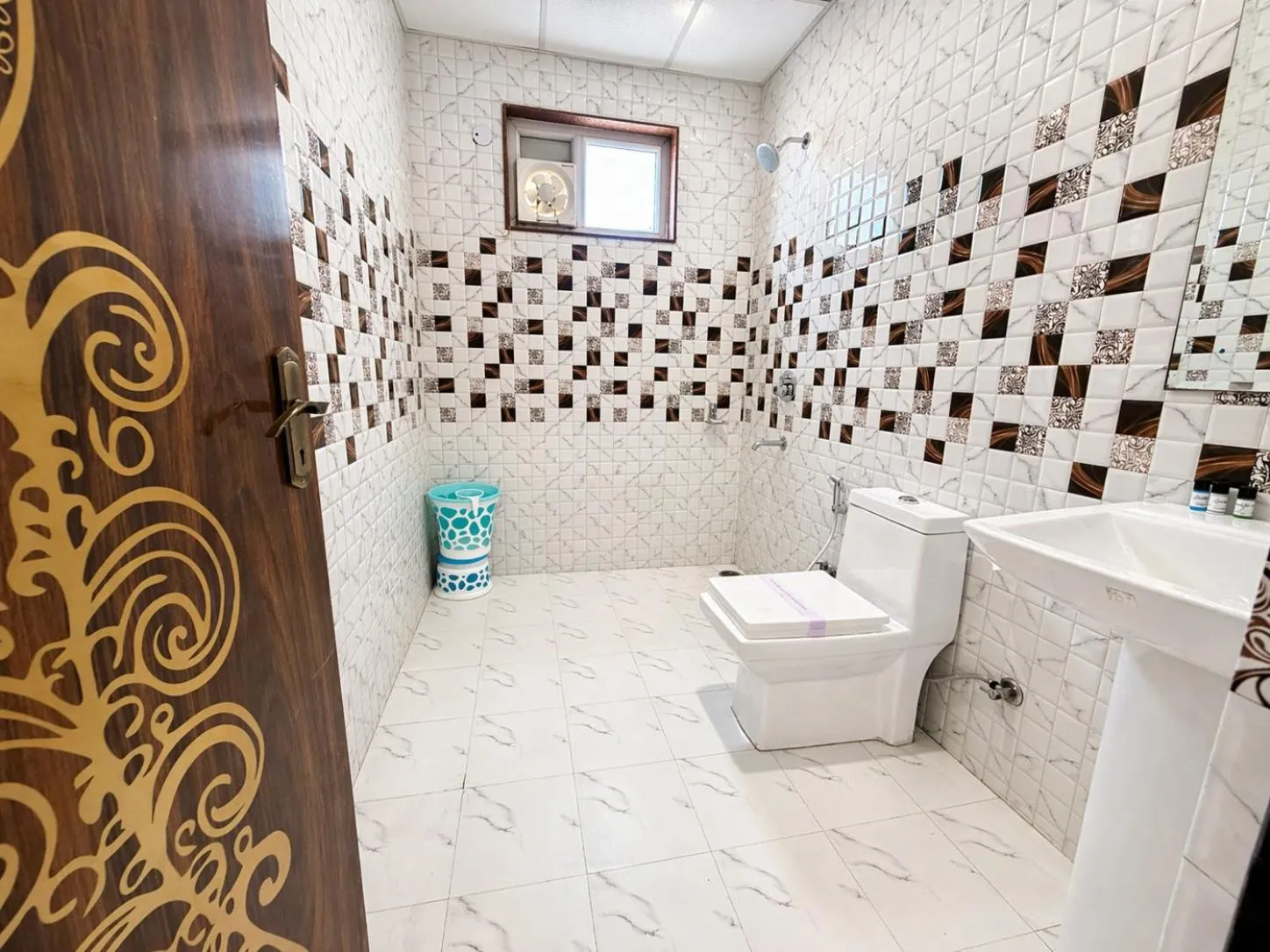 Toilet in Dwelling Residency Hotel