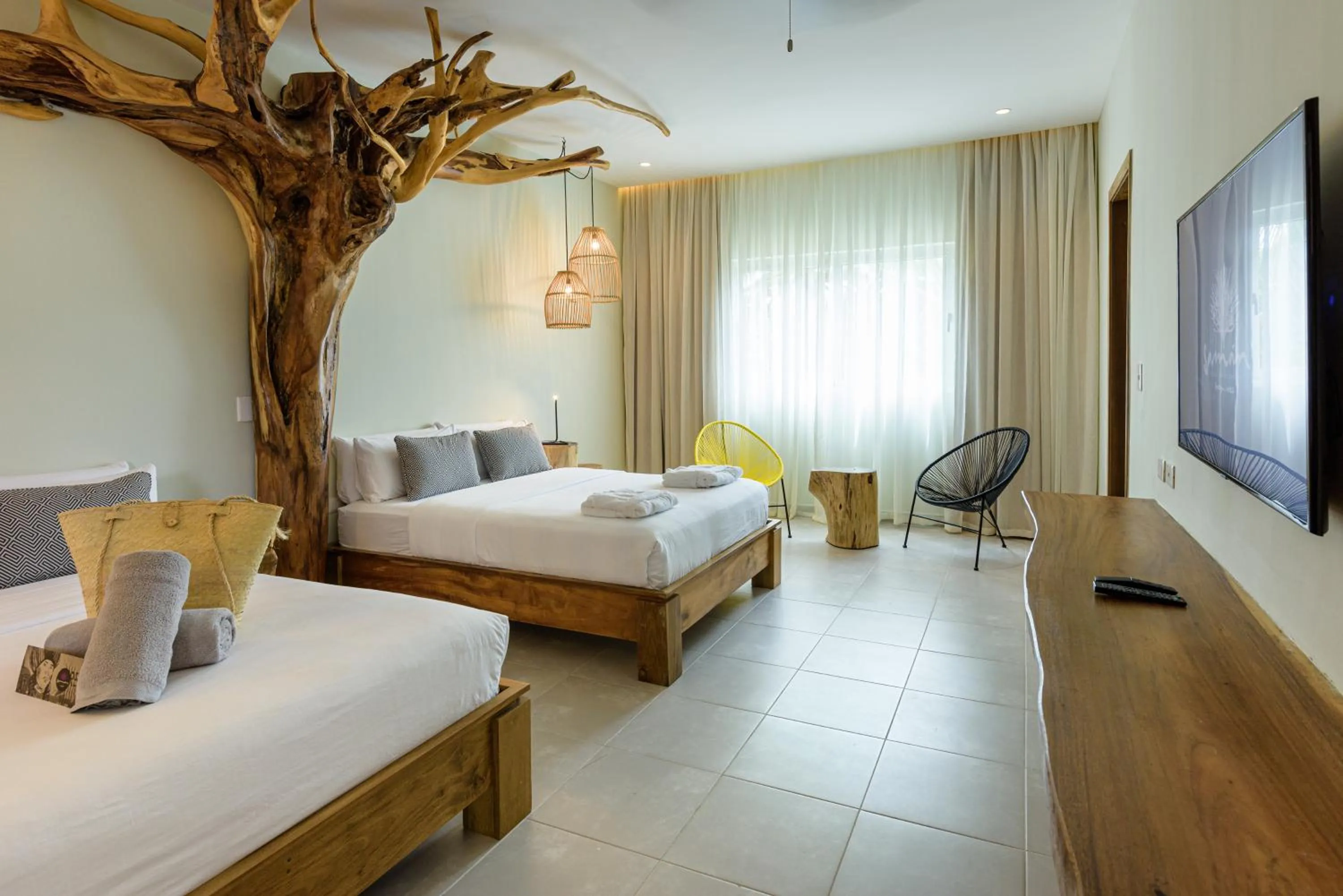 Bedroom in Saman Boutique Hotel By Mint