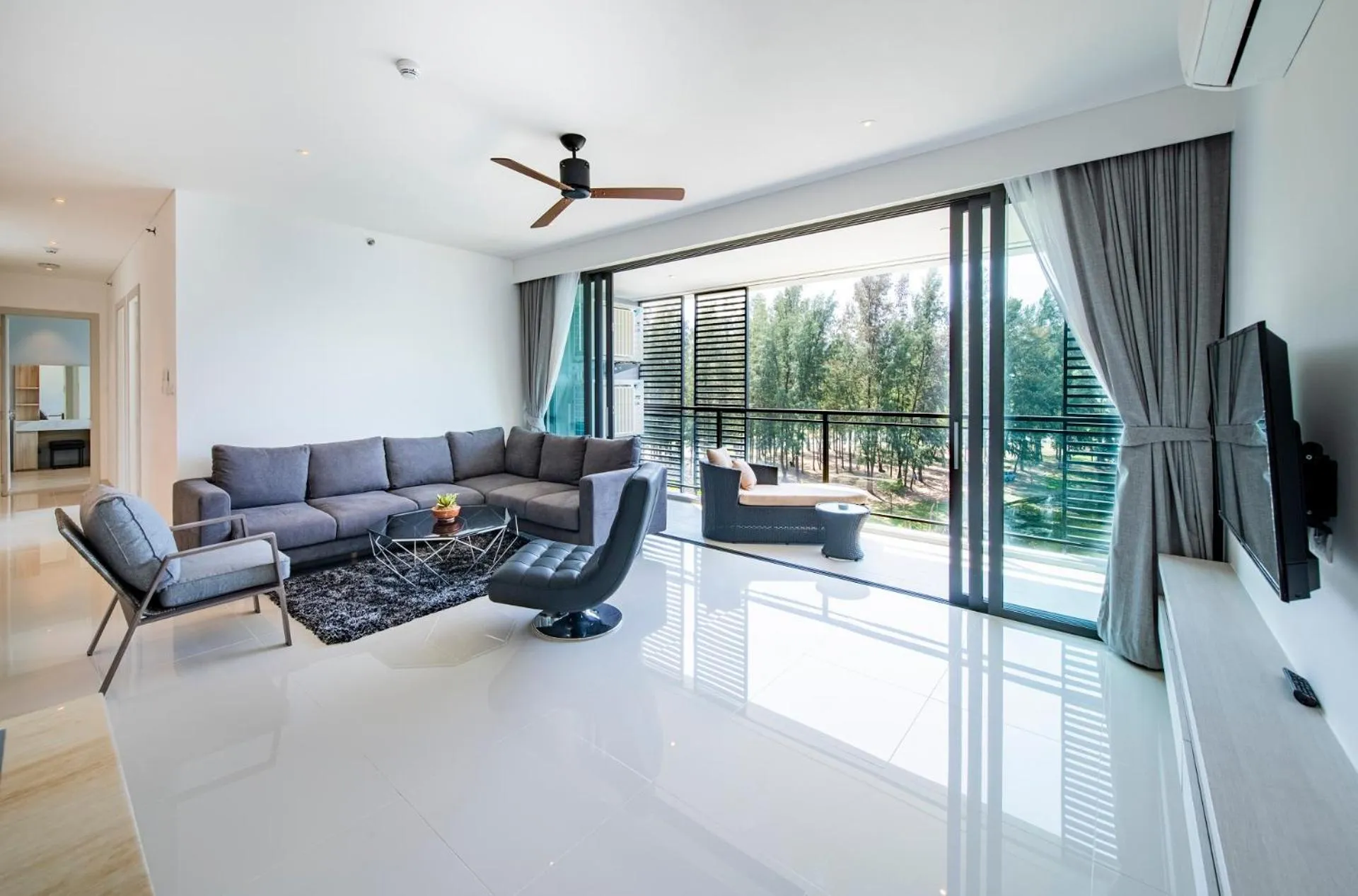 Living room in Cassia Residences by Laguna Phuket