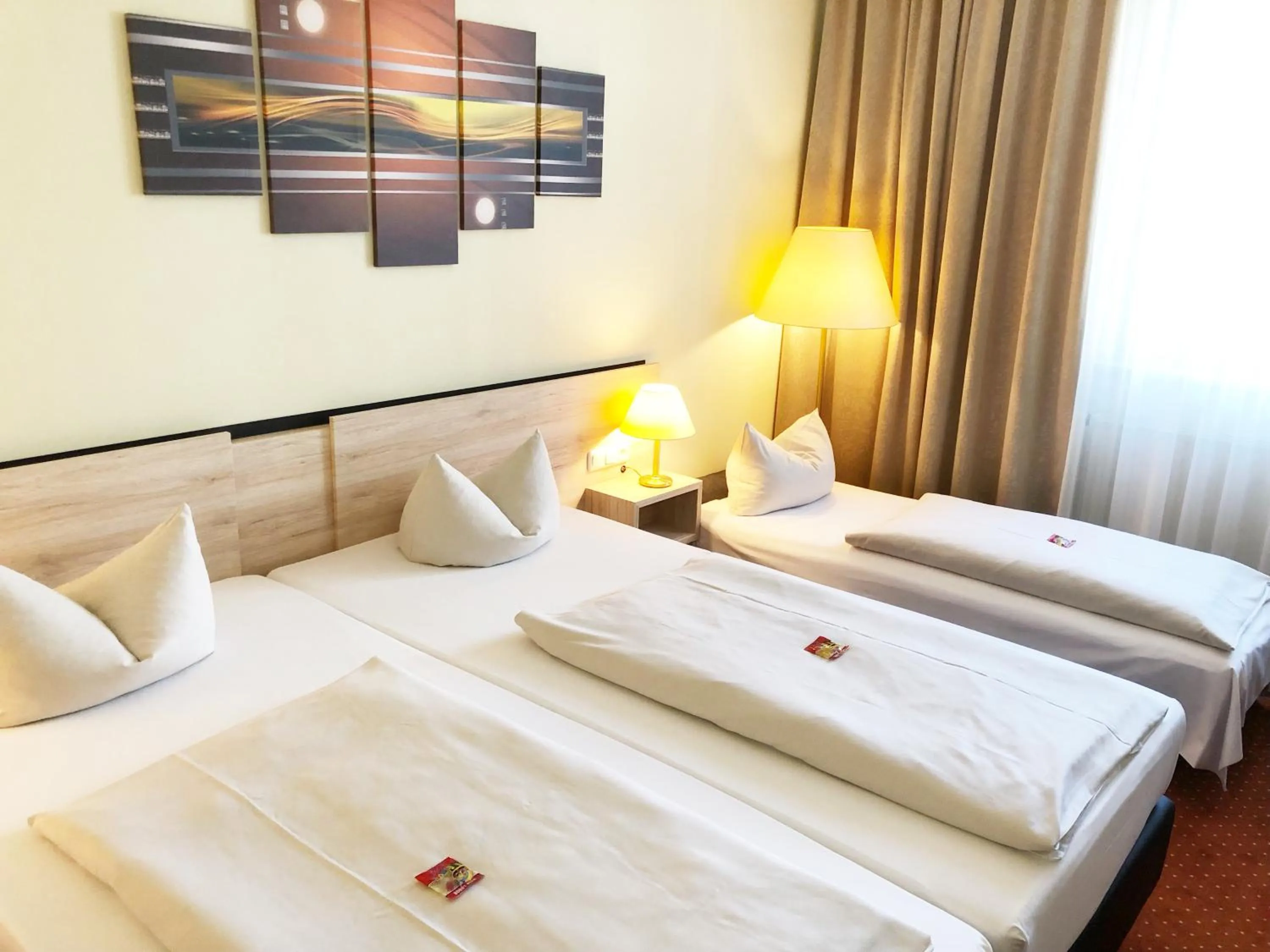 Bed in NOVINA HOTEL Südwestpark