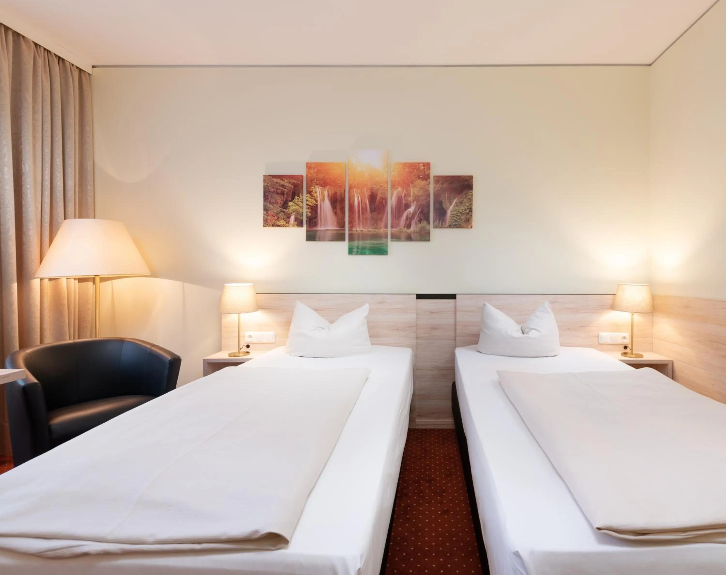 Bed in NOVINA HOTEL Südwestpark