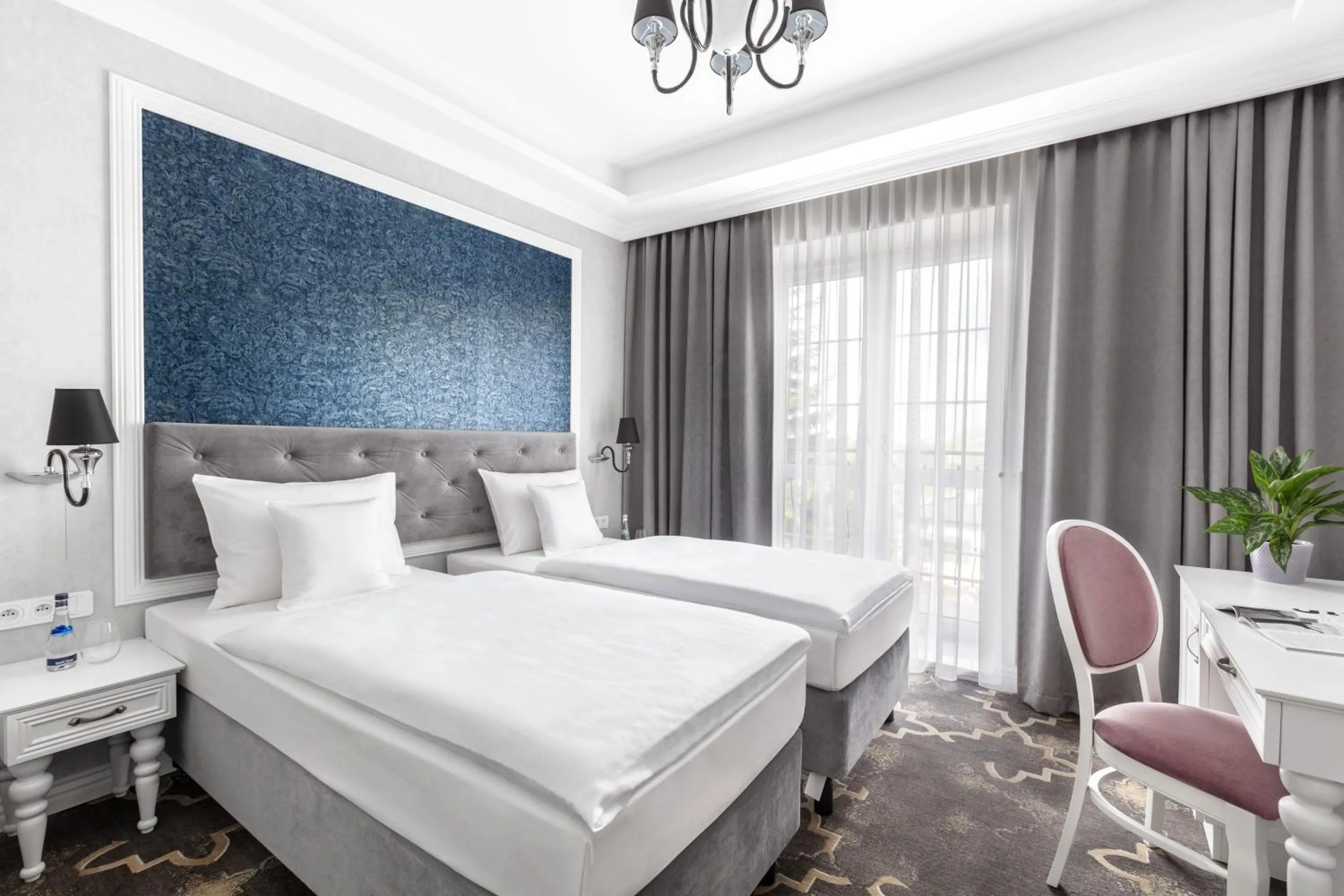 Bed in Merci Boutique Hotel