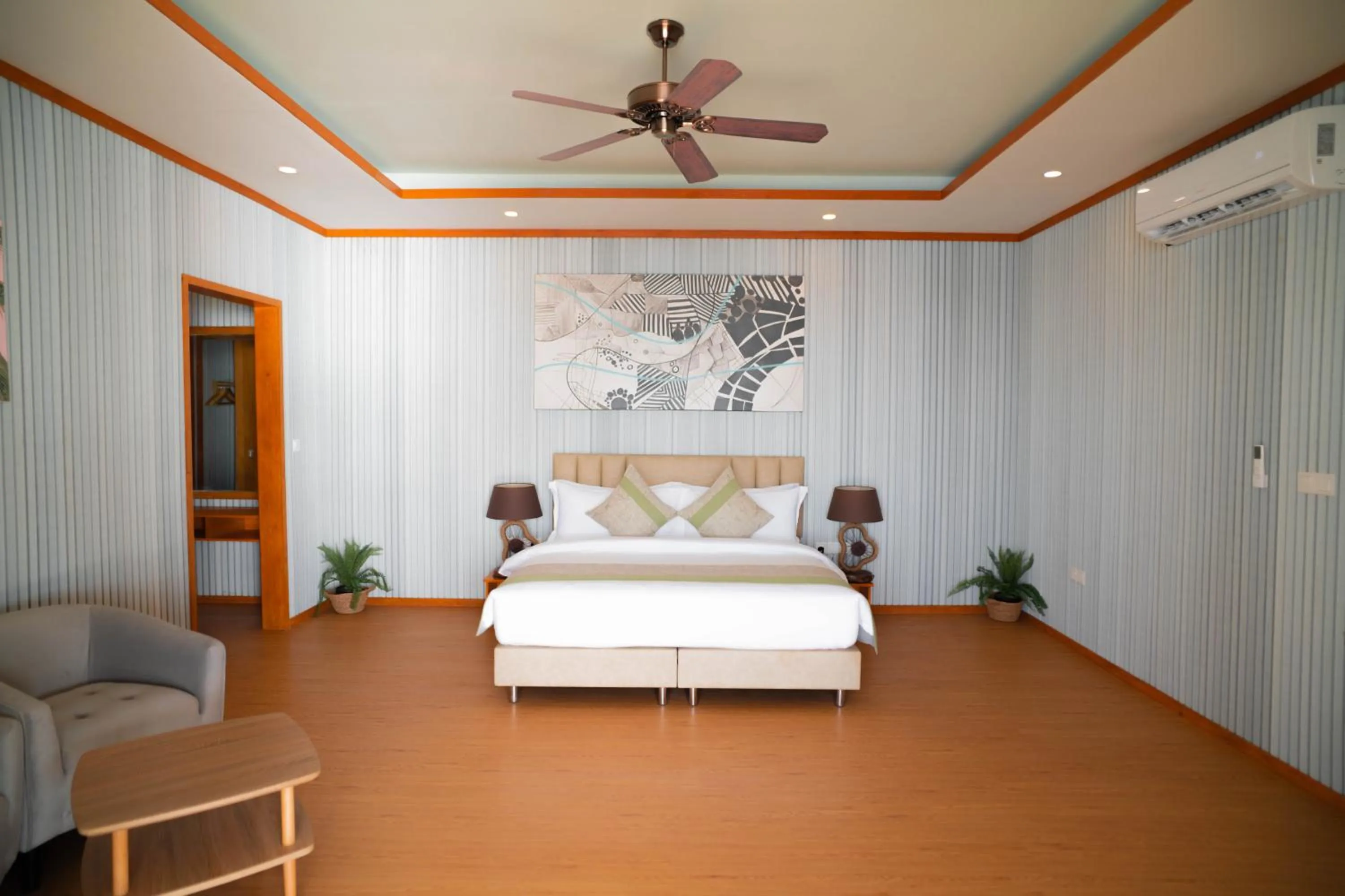 Bed in Brennia Kottefaru Maldives