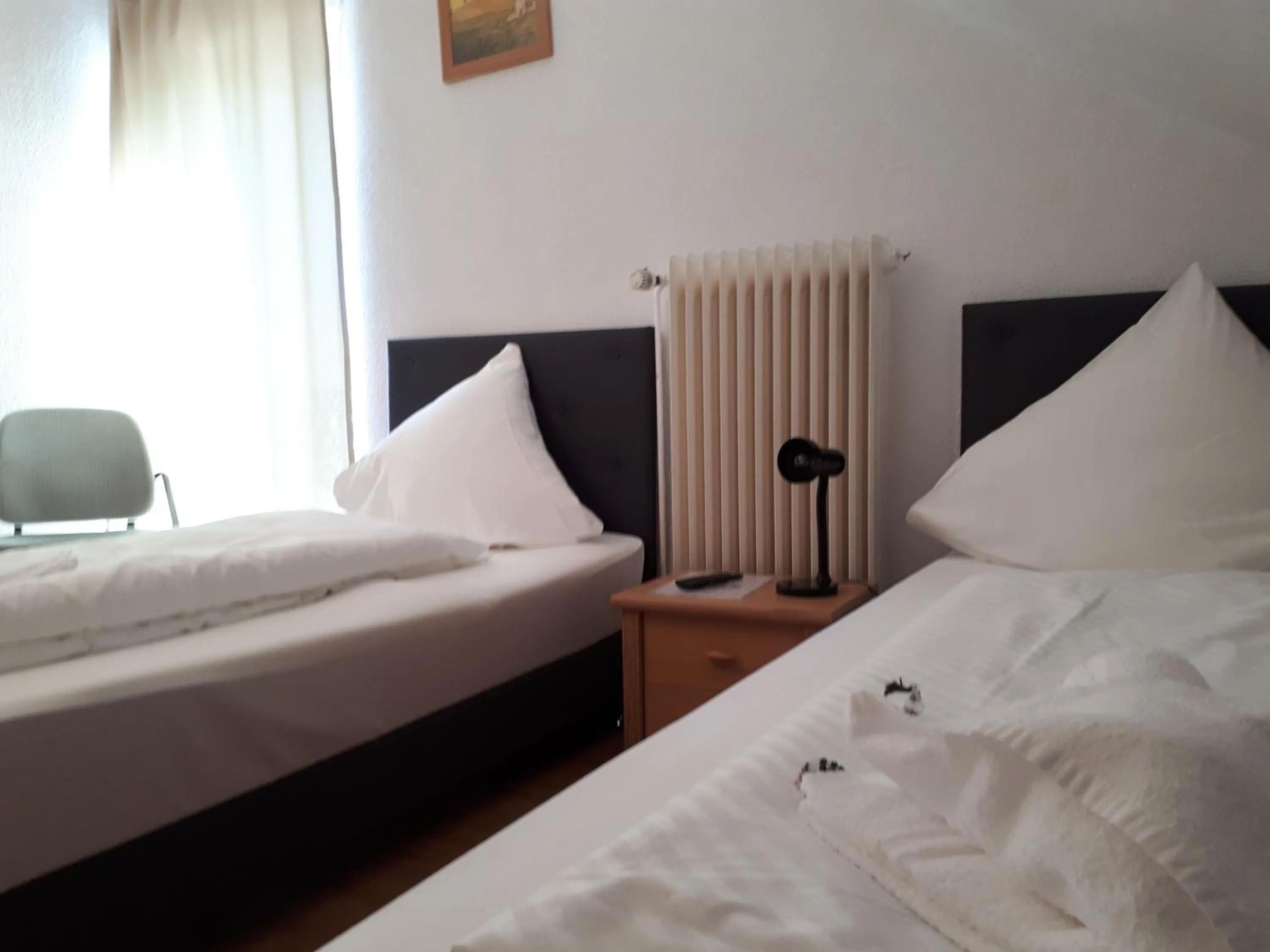 Bed in Hotel Taverne Inos