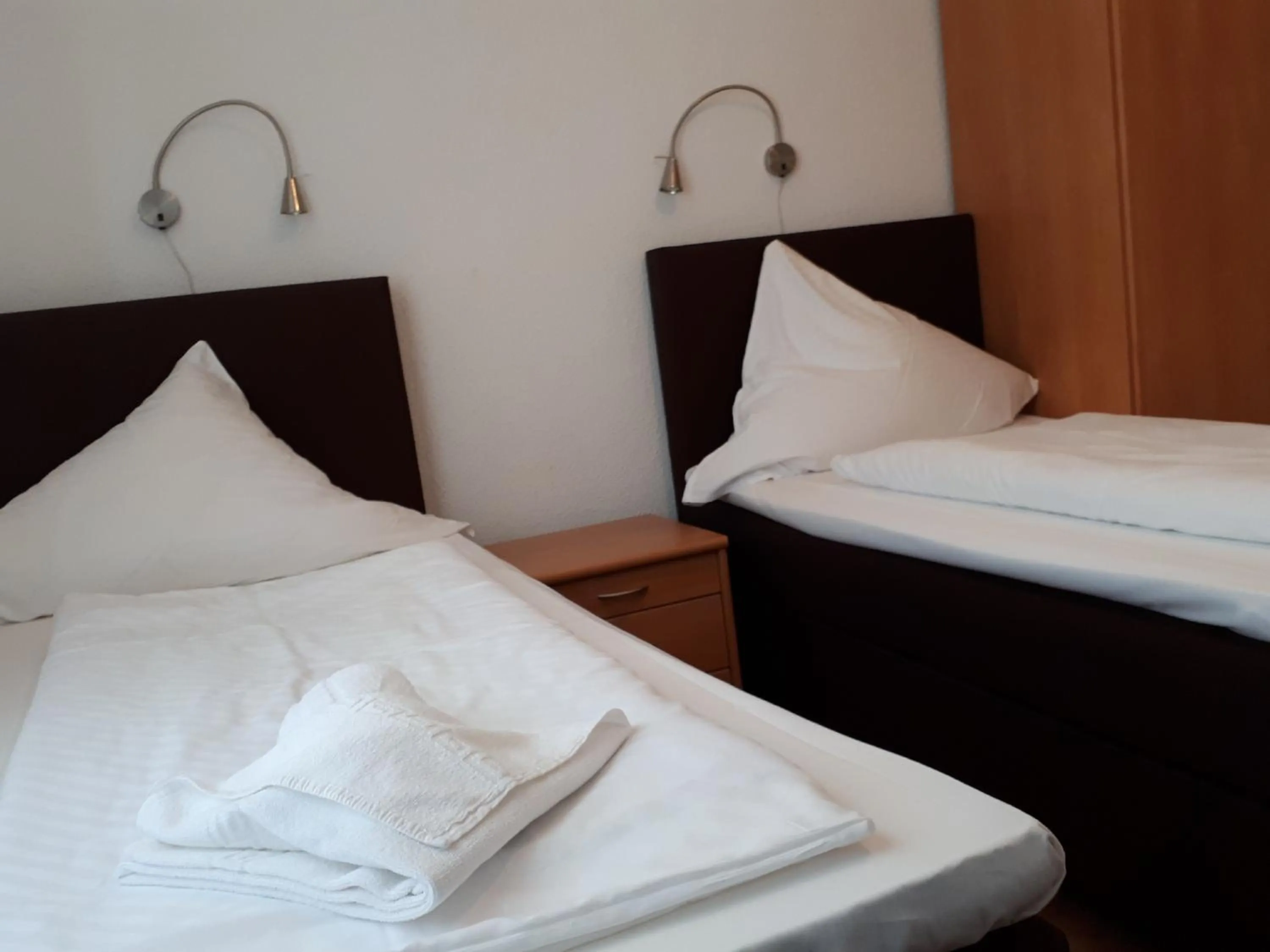 Bed in Hotel Taverne Inos