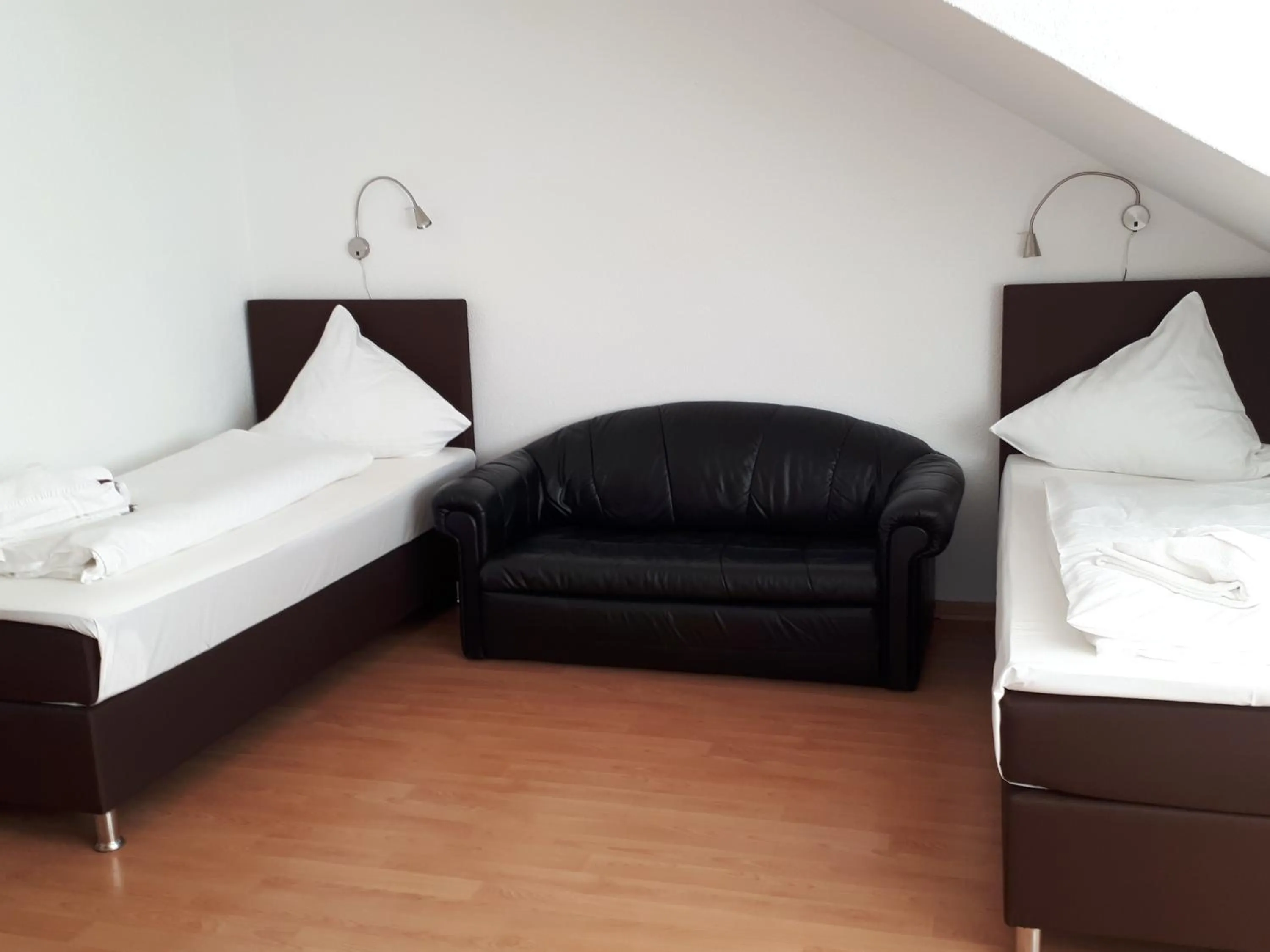 Bed in Hotel Taverne Inos