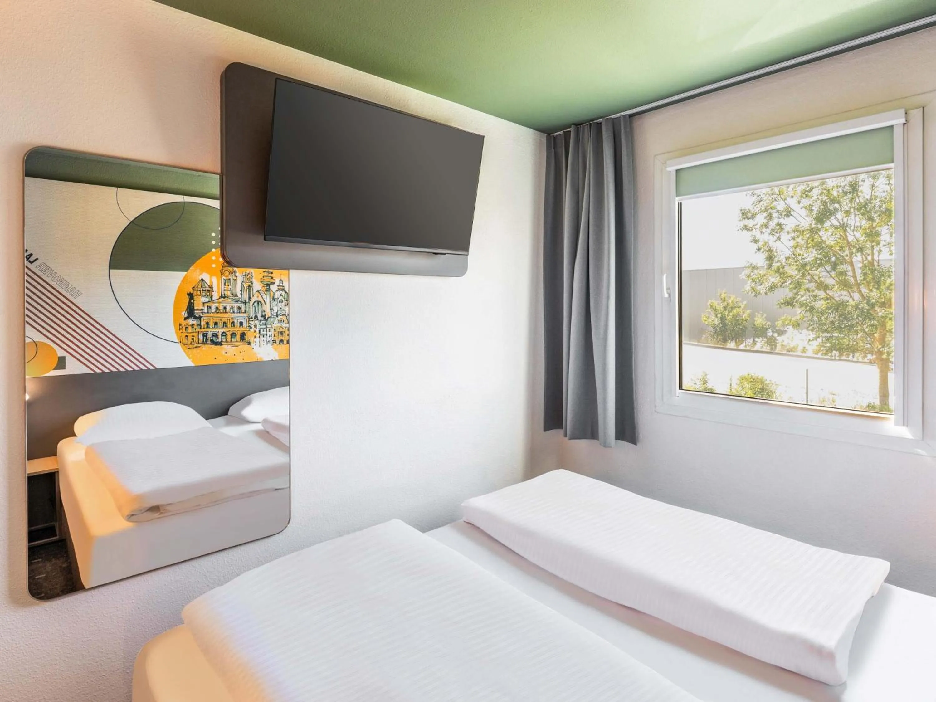 Photo of the whole room, Bed in B&B HOTEL Hannover-Laatzen