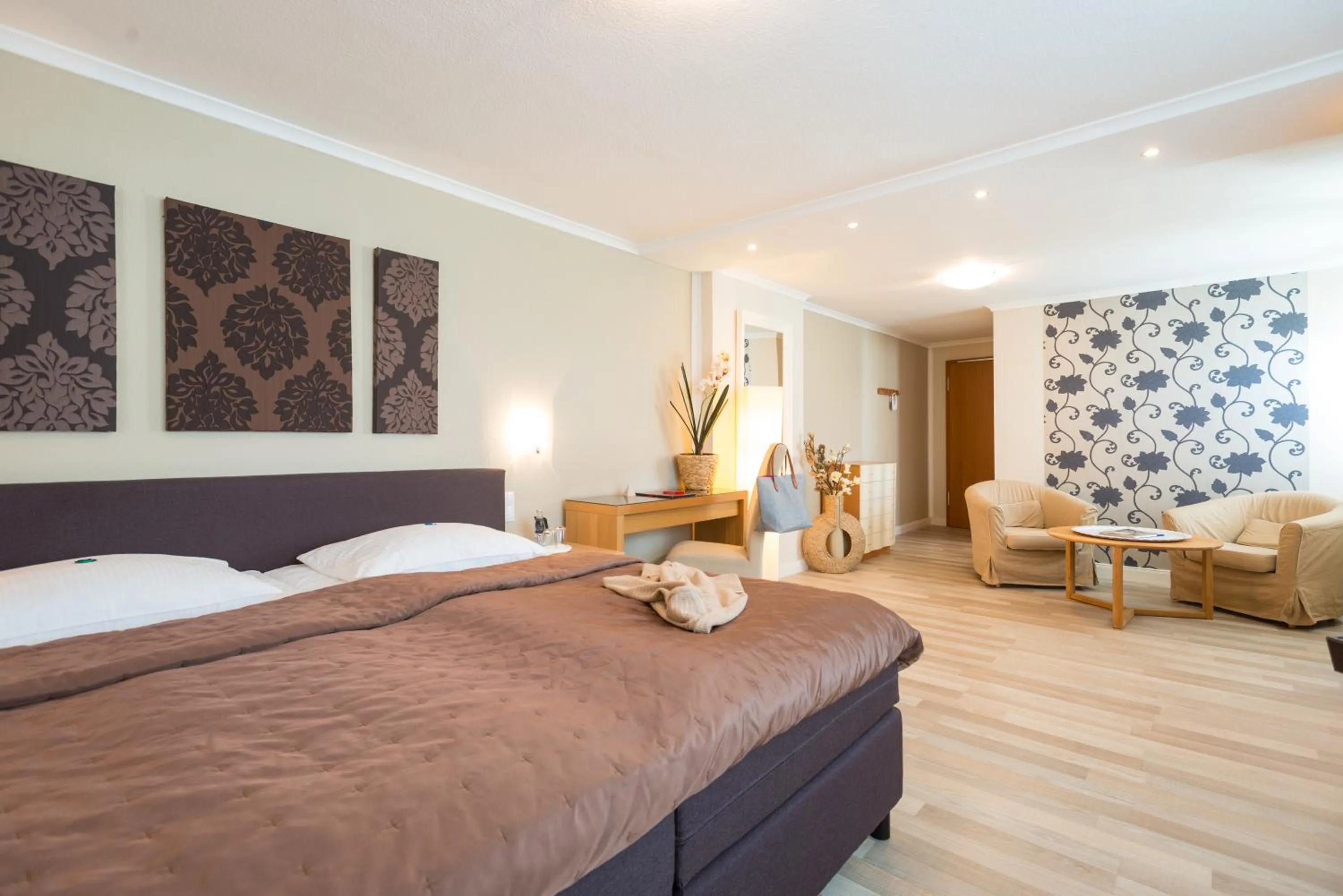 Seating area, Bed in Hotel Ahrbella