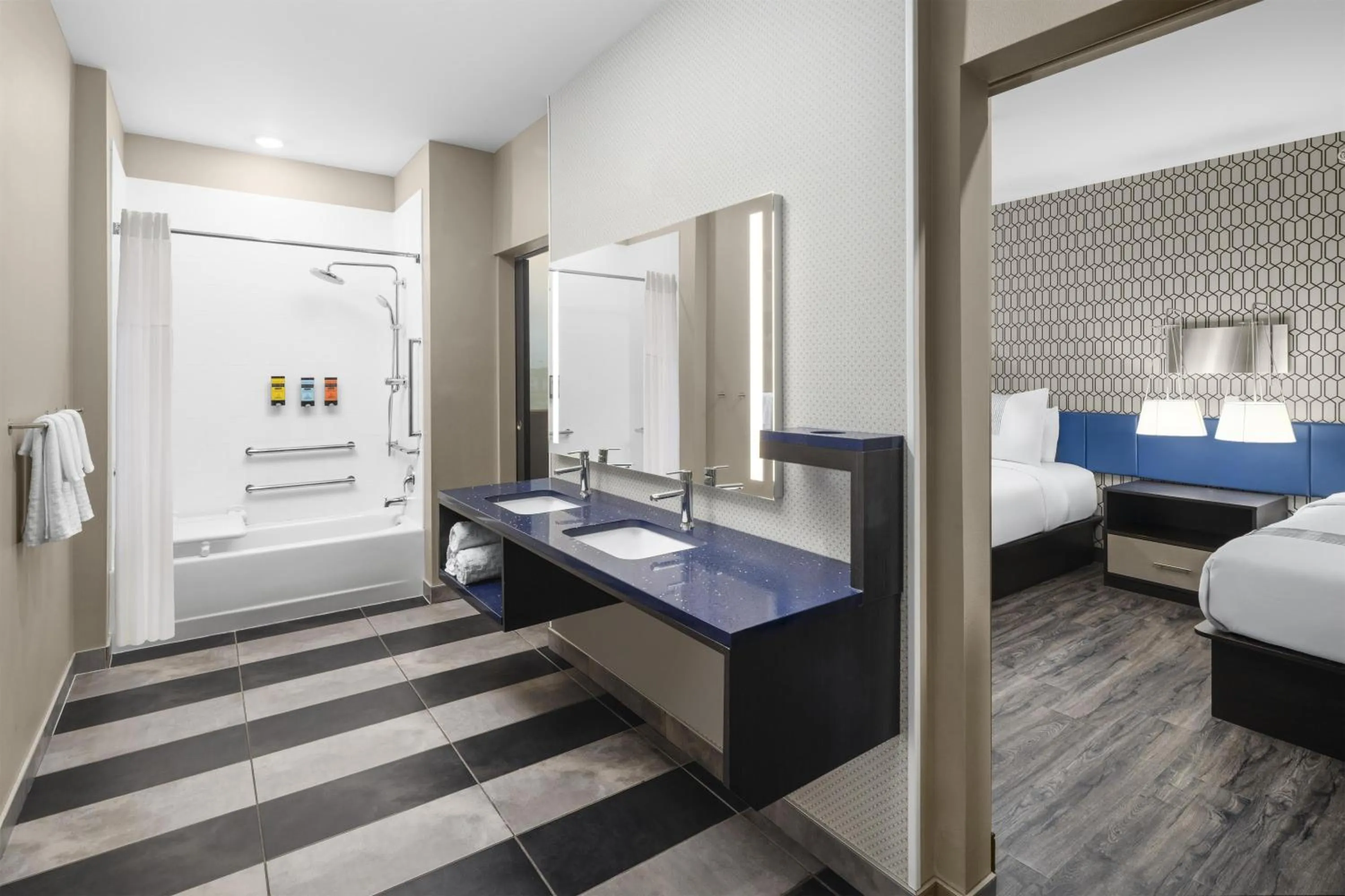 Bathroom, Bed in GLō Best Western Dawley Farms In Sioux Falls