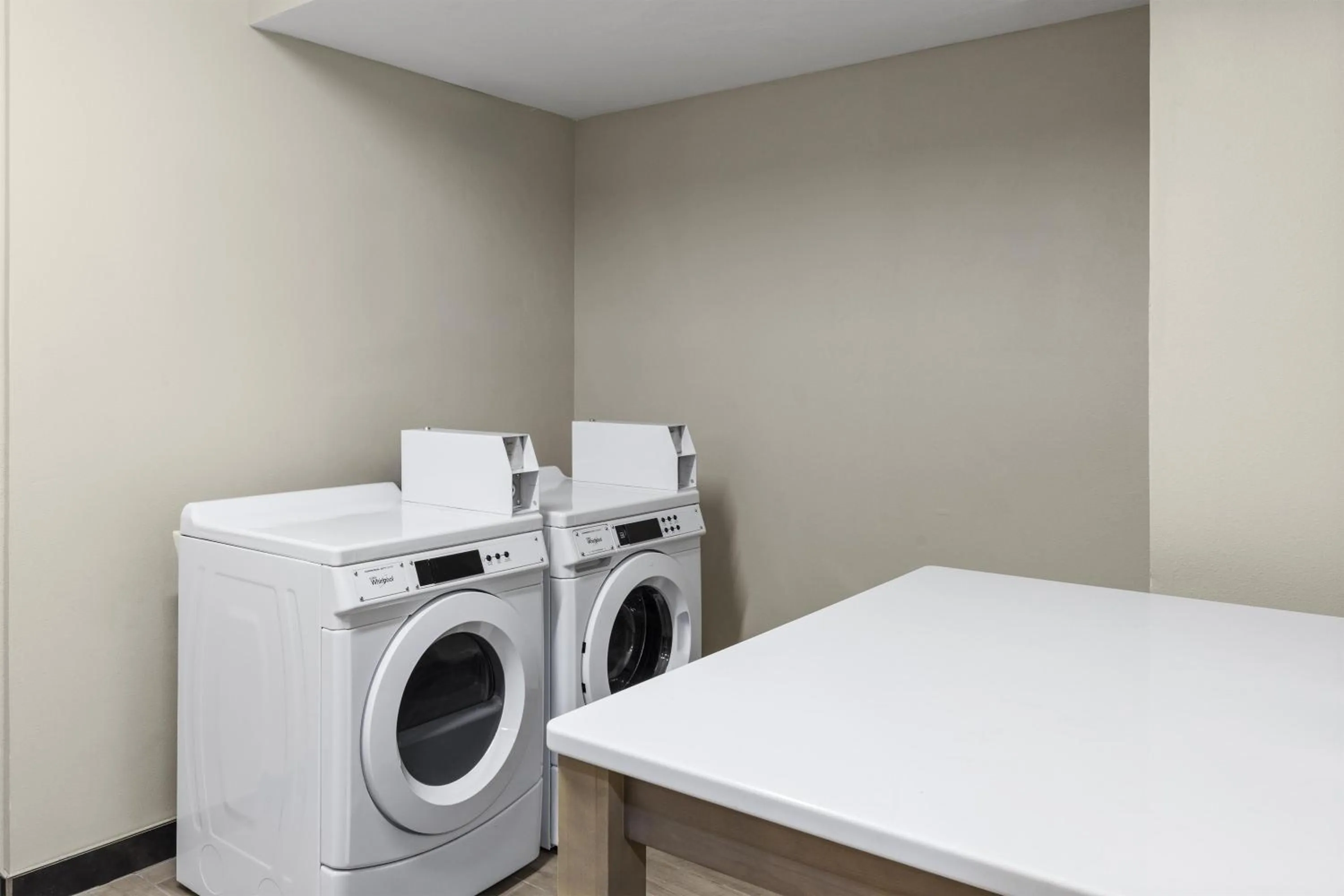 laundry in GLō Best Western Dawley Farms In Sioux Falls