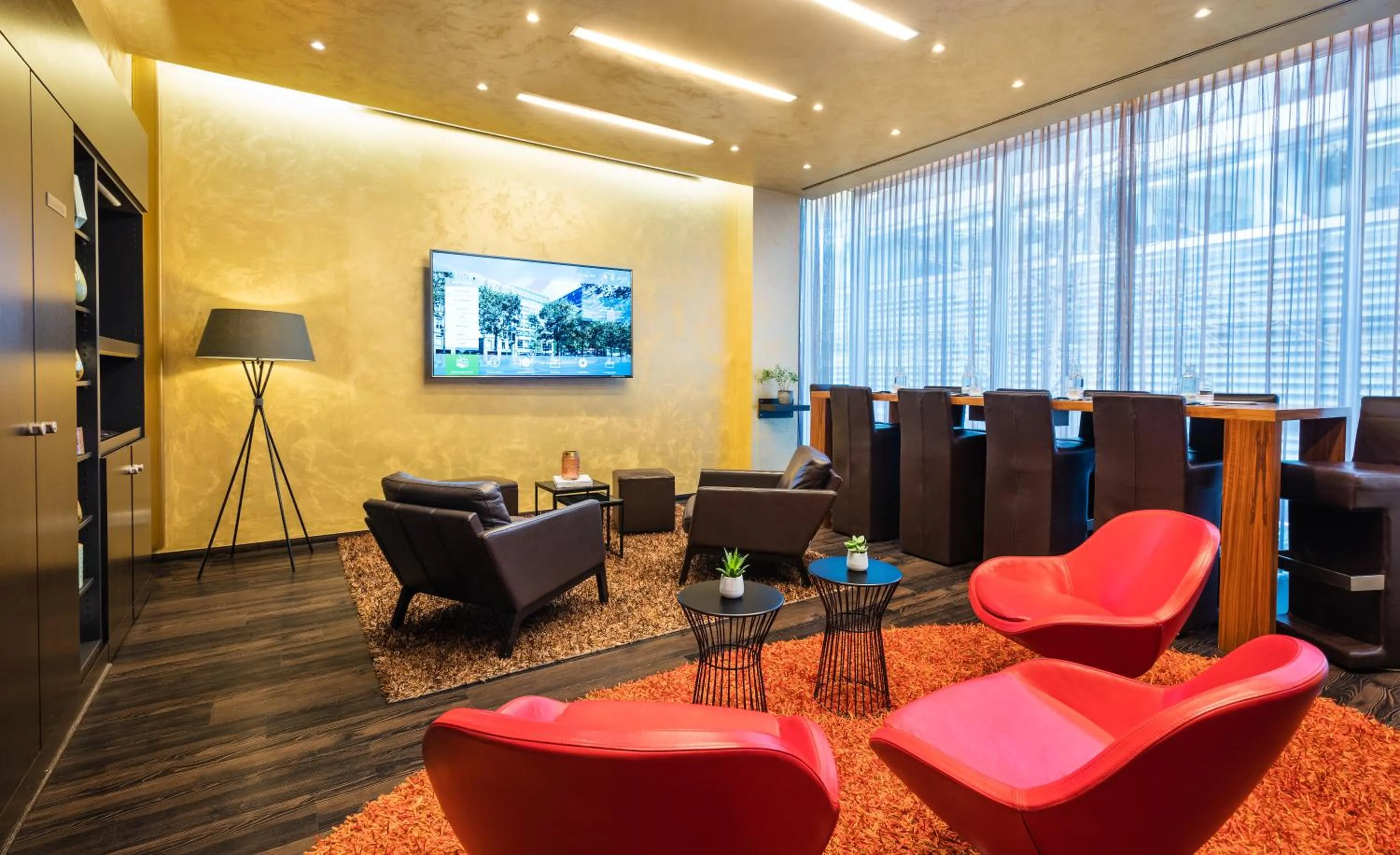 Communal lounge/ TV room in Lindner Hotel Berlin Ku'damm, part of JdV by Hyatt