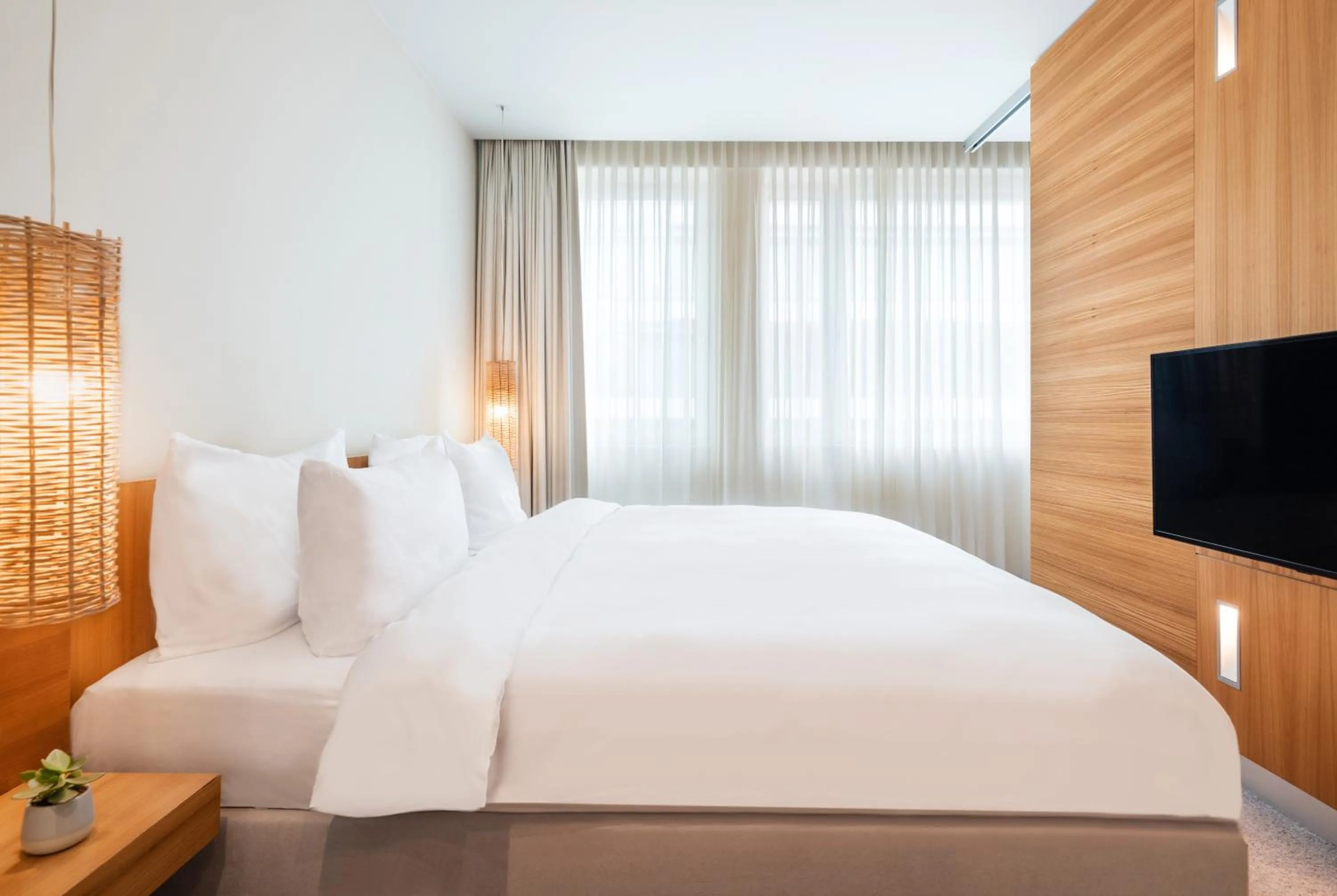 Bed in Lindner Hotel Berlin Ku'damm, part of JdV by Hyatt