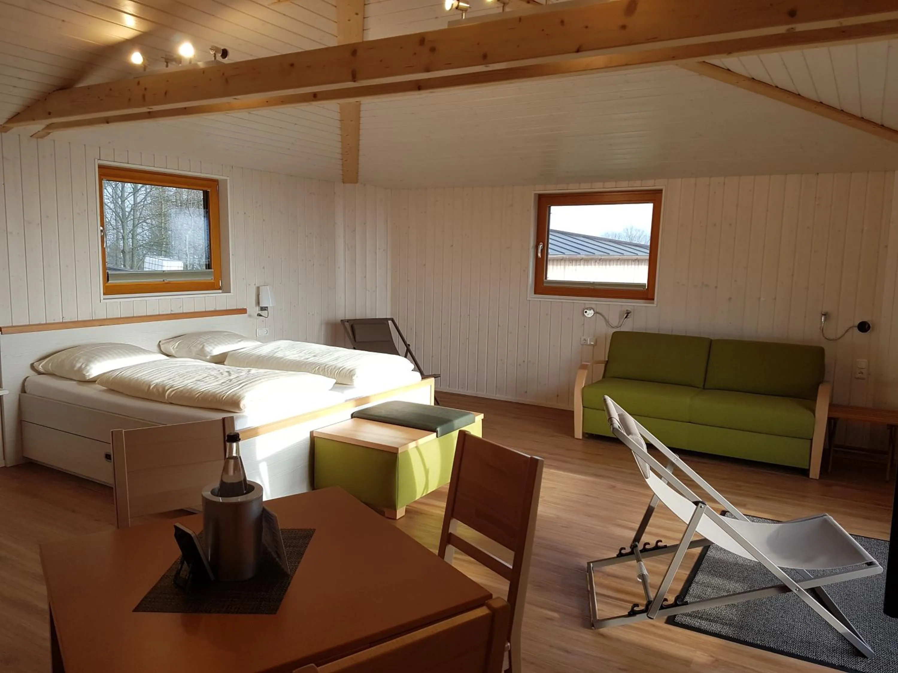 Bedroom, Bed in Hotel Waldquelle - Baumhaushotel Aerzen